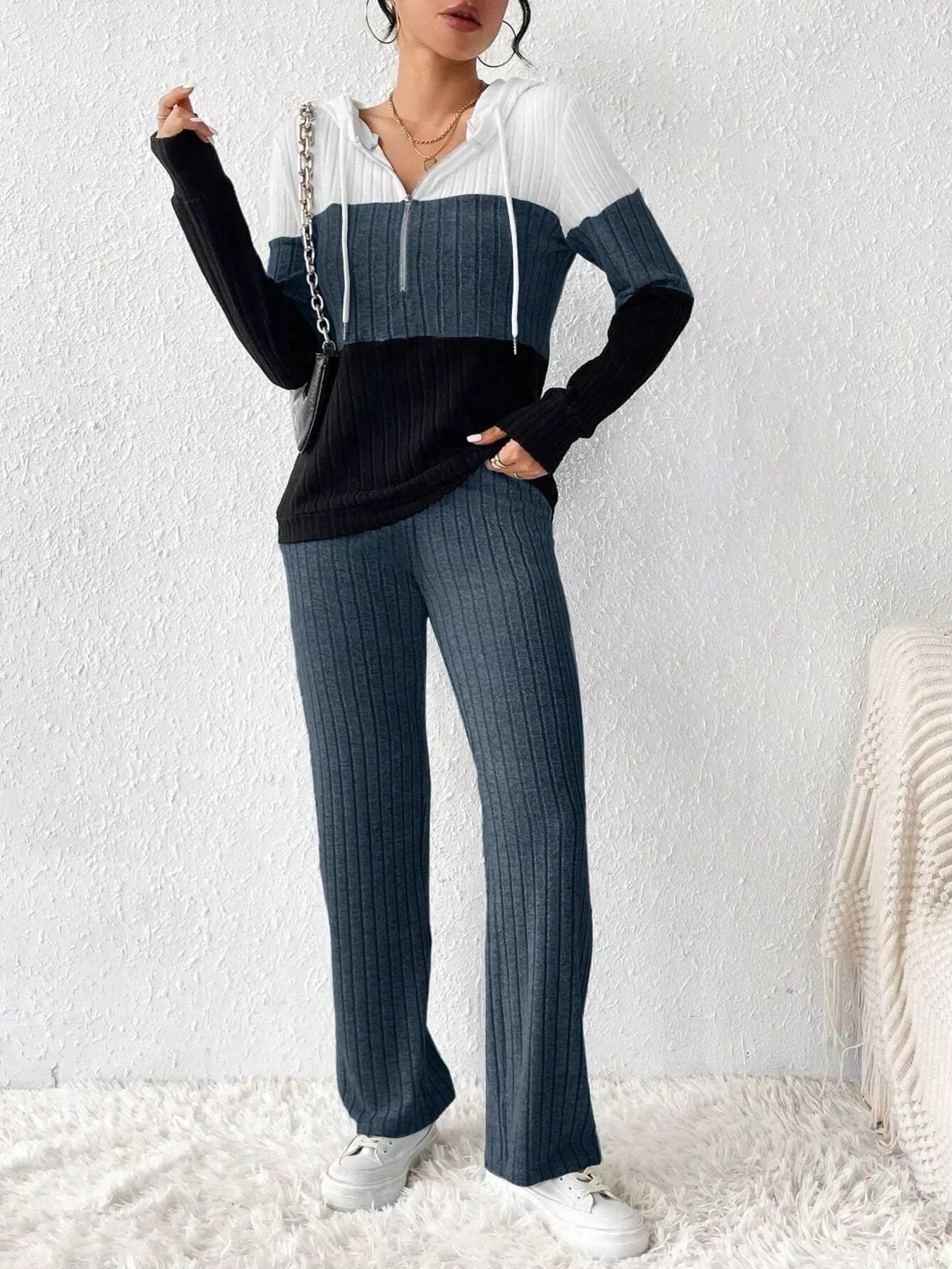 Color block half zip hooded top and matching pants set by Trendsi, featuring vibrant color blocks and comfortable casual style.