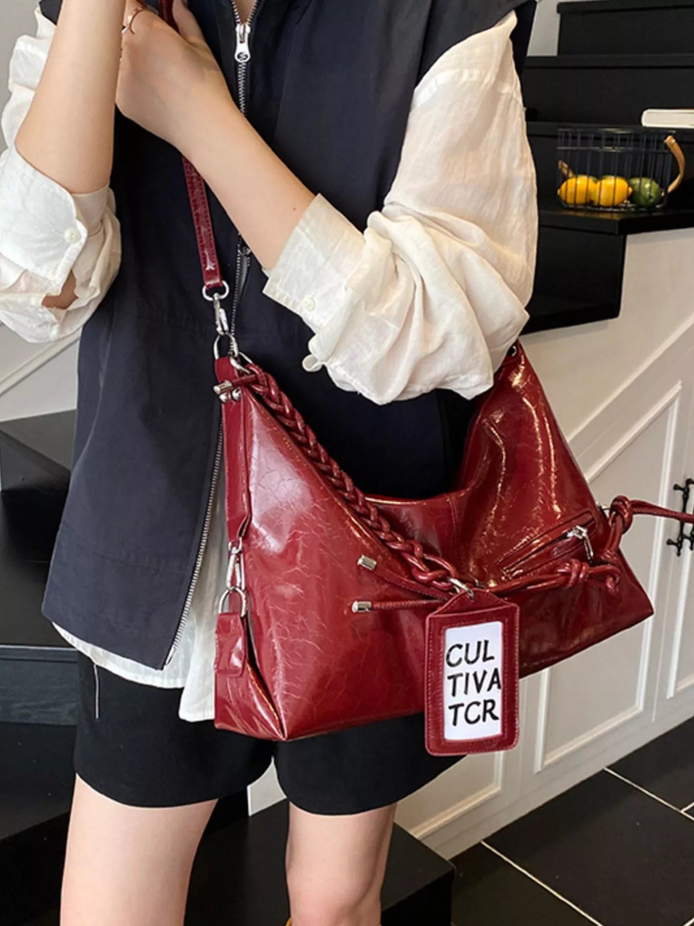 Vintage braided strap shoulder handbag with woven design and leather accents, stylish Trendsi accessory for everyday use.