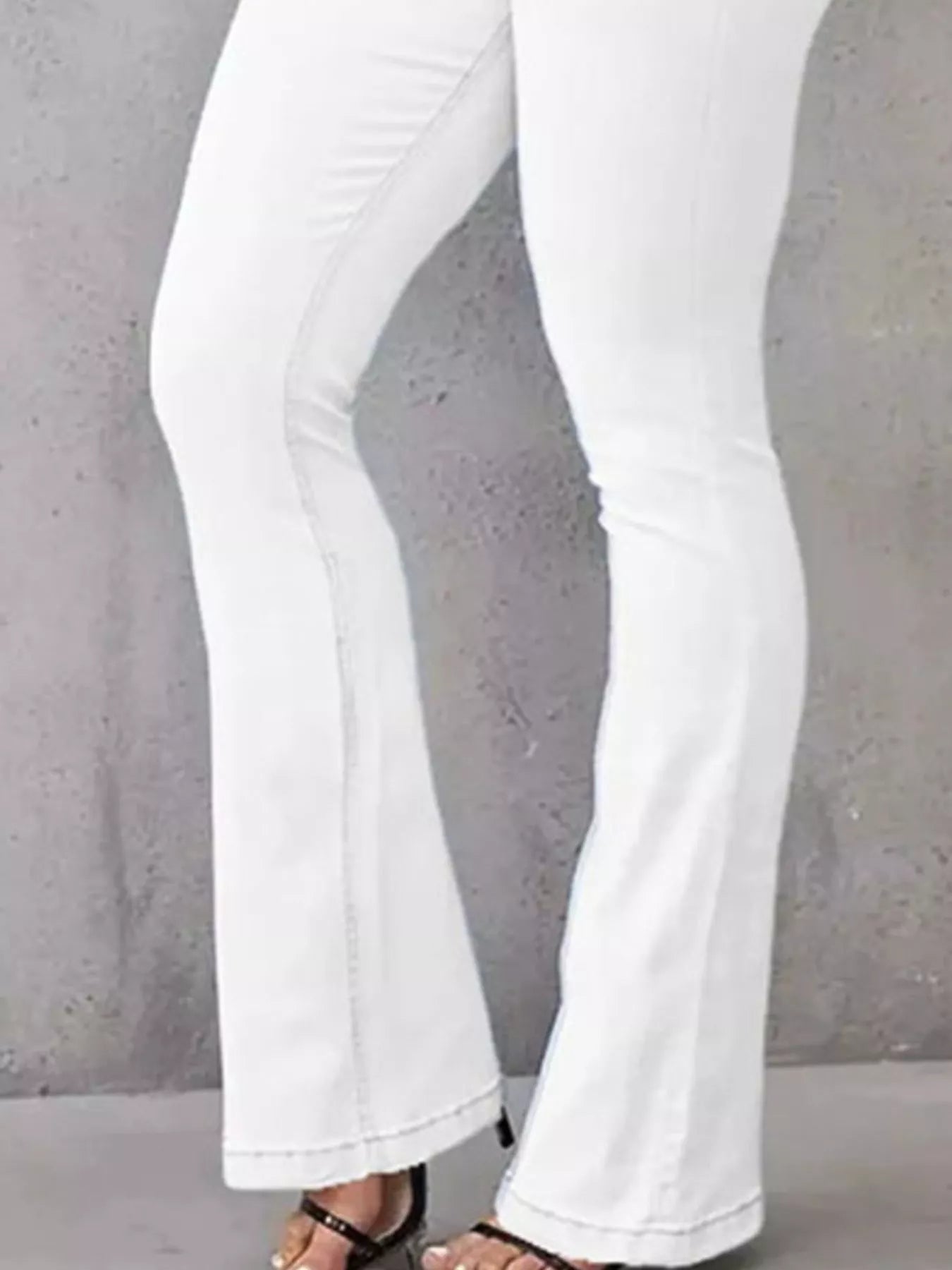 High-waisted flare jeans from Trendsi, showing the stylish bottoms with a fitted waist and flared leg design.