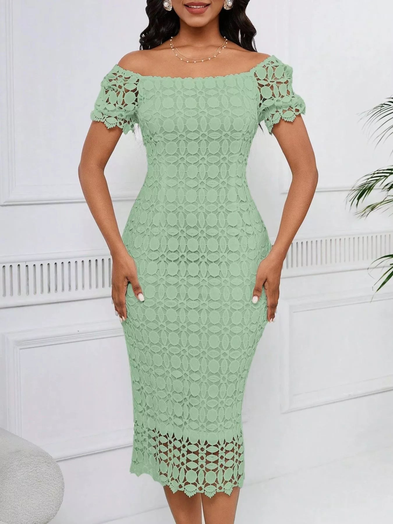 Lace short sleeve midi dress from Trendsi featuring a fitted bodice and elegant flowy skirt, perfect for stylish occasions.