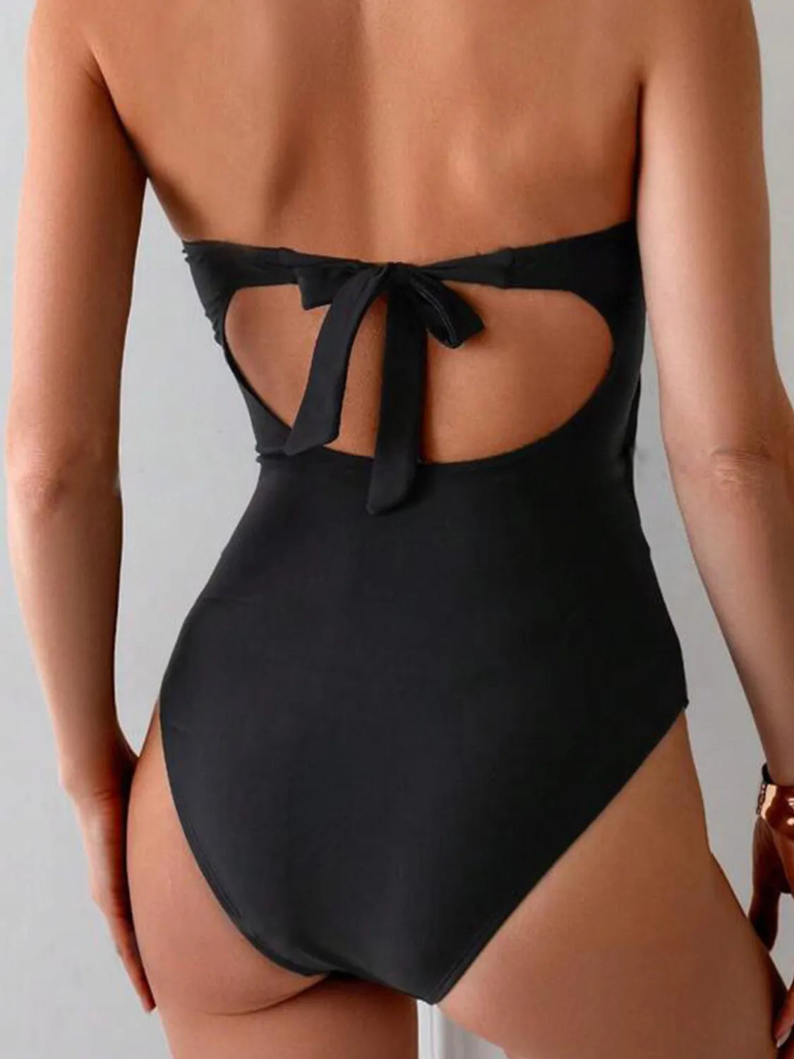 Trendsi cutout sweetheart neck one-piece swimwear featuring stylish design and vibrant color, perfect for beach or poolside.