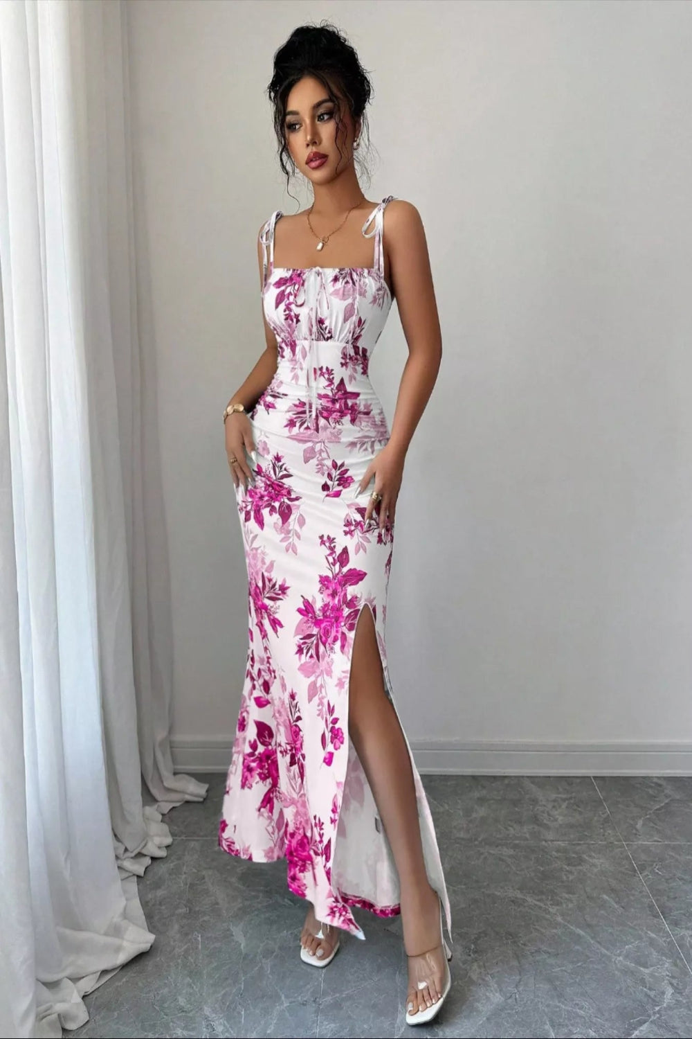 Printed tie strap slit maxi dress from Trendsi featuring a flowy silhouette and stylish slit detail.
