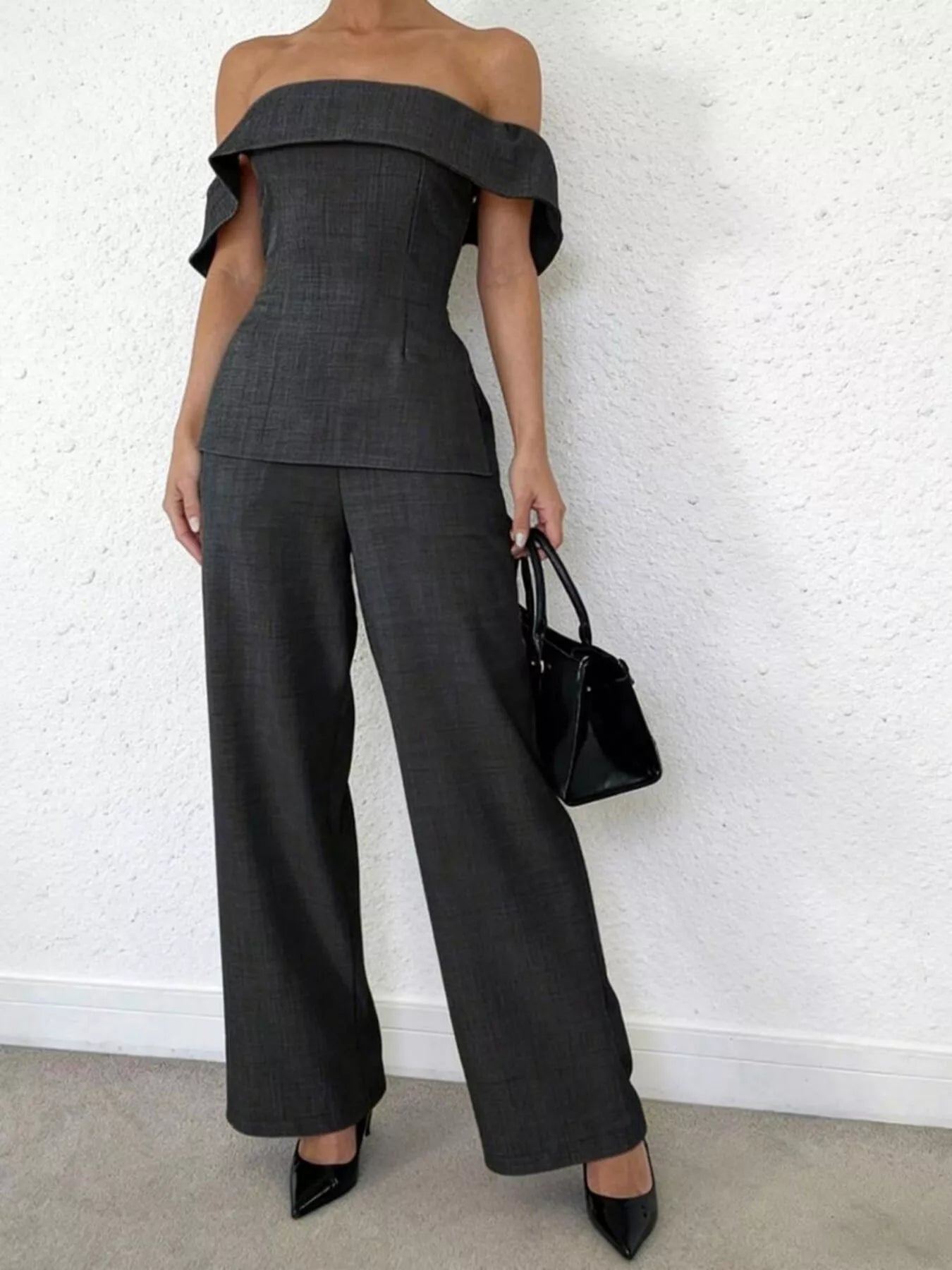 After 5 off-shoulder top and wide-leg pants set by Trendsi, featuring a stylish off-shoulder design and flowing wide-leg trousers.