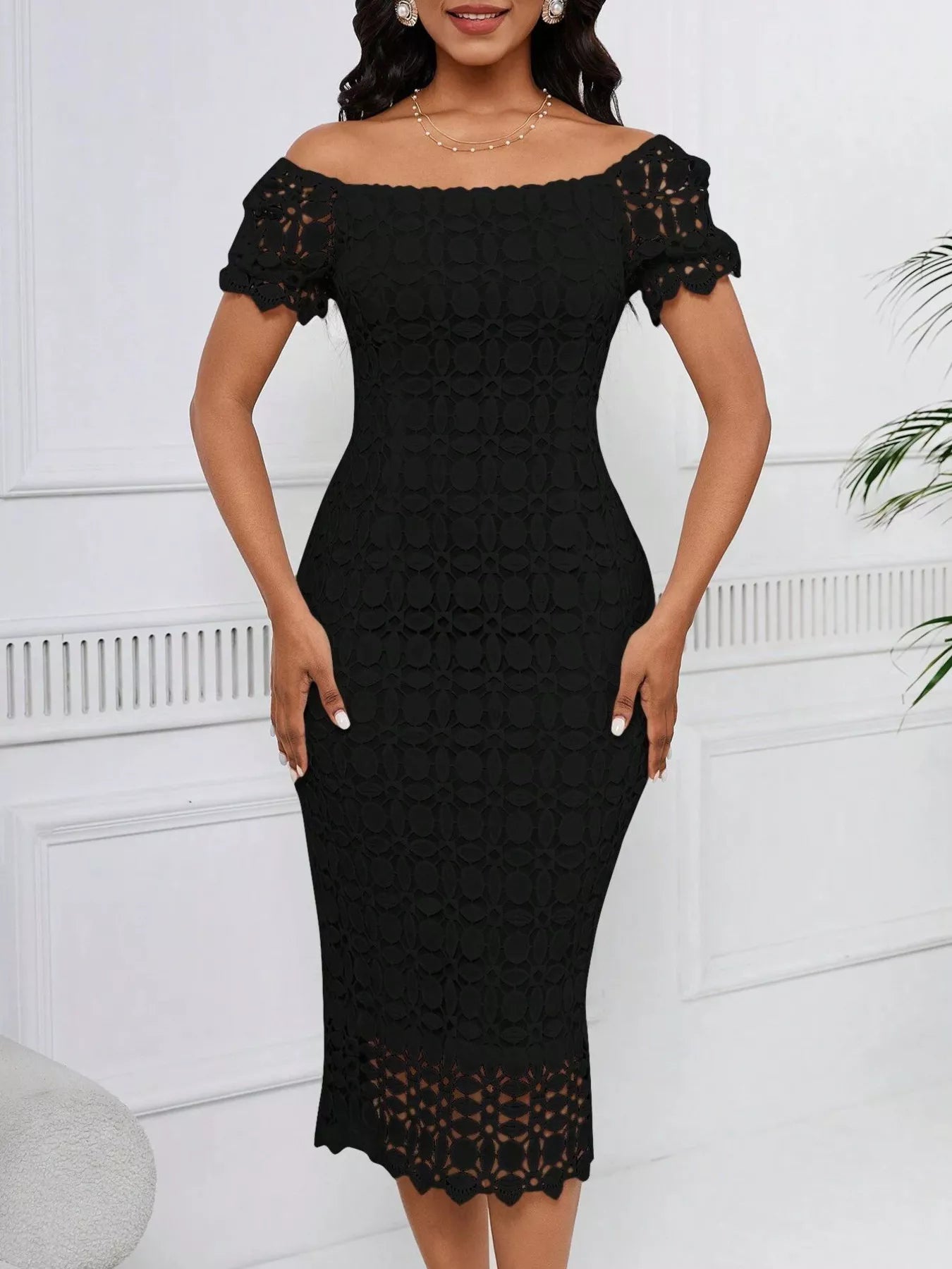 Lace short sleeve midi dress from Trendsi featuring a fitted bodice and flowy skirt, perfect for elegant occasions.