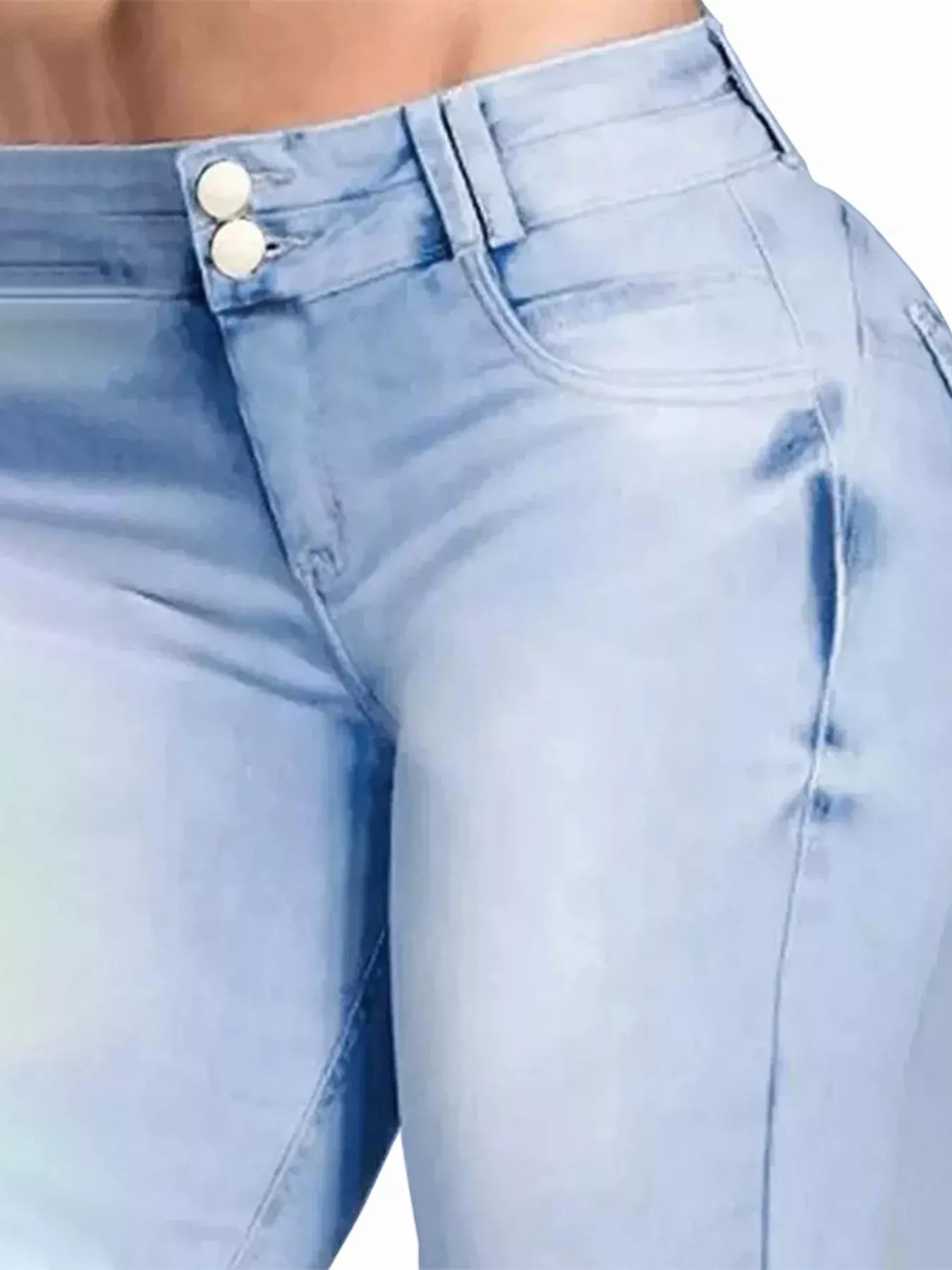 High-waisted flare jeans from Trendsi with a stylish fit, shown on a model, highlighting the denim's shape and design.