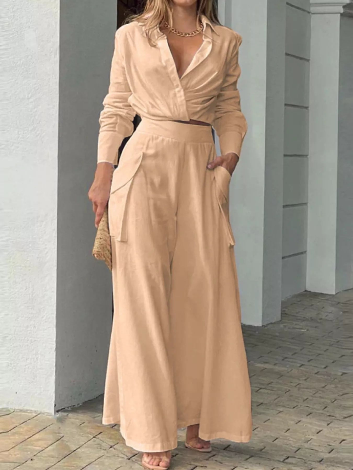 Button front shirt and pocketed wide-leg pants set by Trendsi, featuring a casual, stylish look with a button-up top and flowy pants.