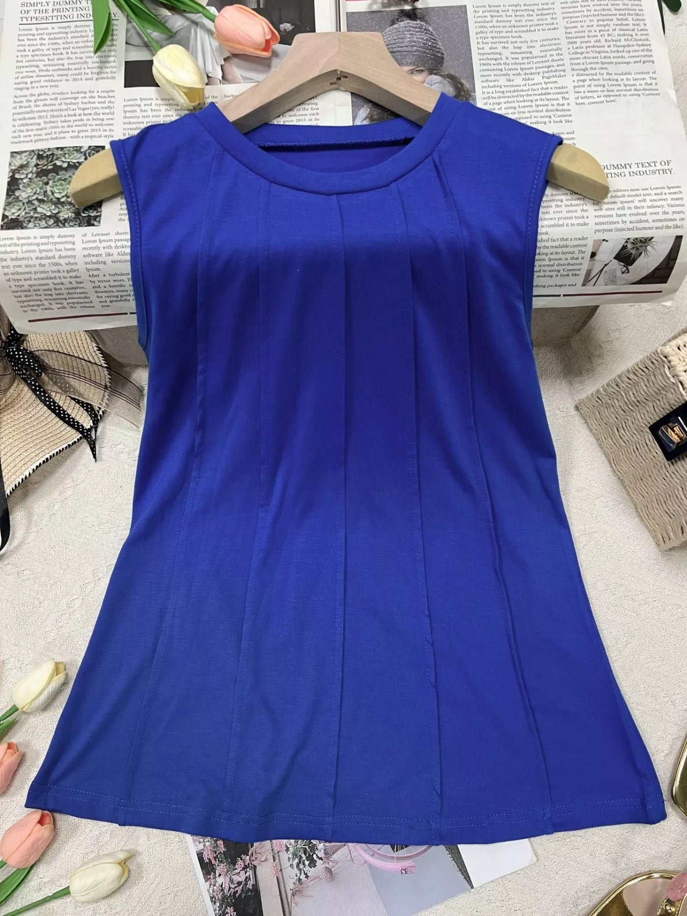 Wide ribbed detailed tank top by Trendsi, featuring a fitted design with textured ribbed fabric and sleeveless style.