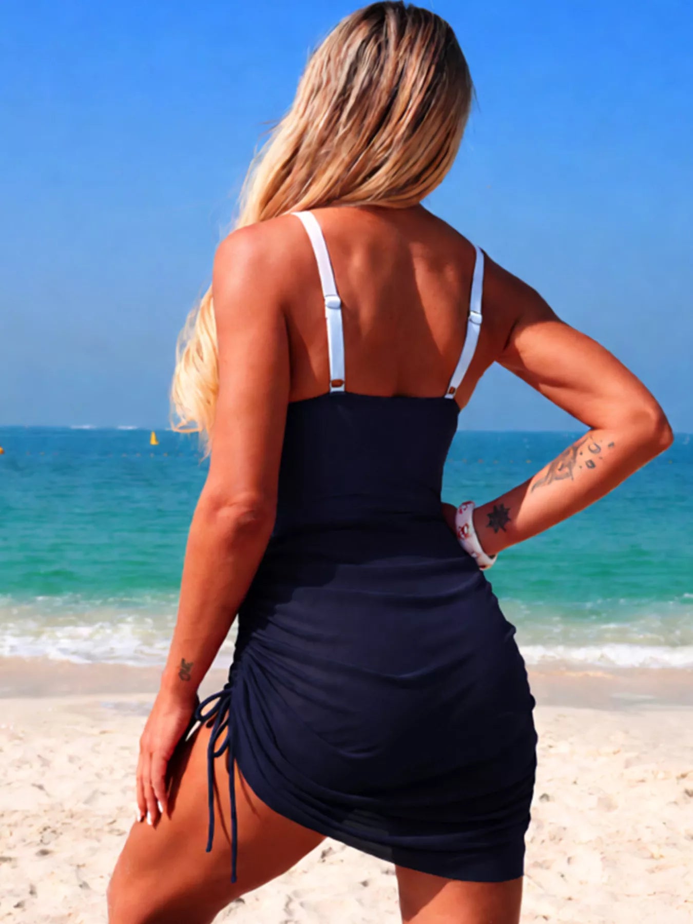 Color block cutout one-piece swimsuit by Trendsi, featuring bold color blocks and stylish cutout design, perfect for swimwear.