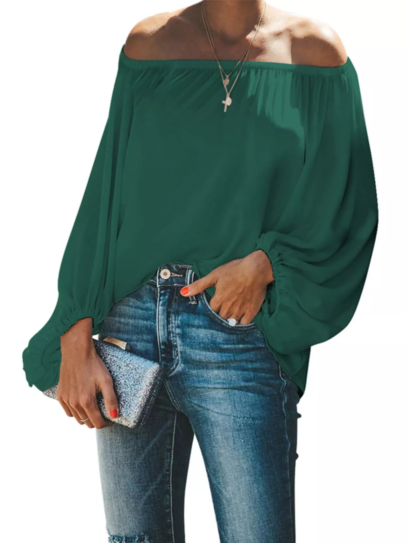 Off-shoulder balloon sleeve blouse by Trendsi, featuring a flowy design and feminine style, shown on a model.