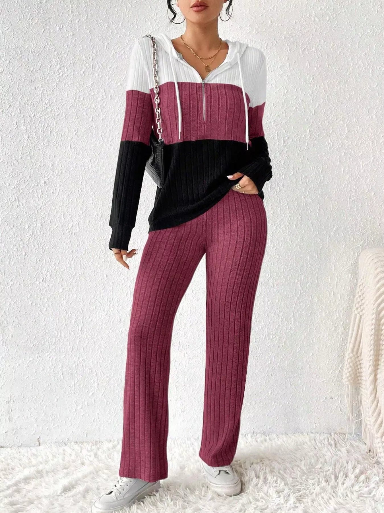 Color block half zip hooded top and pants set by Trendsi, featuring a stylish, casual look with vibrant color blocking and comfortable fit.