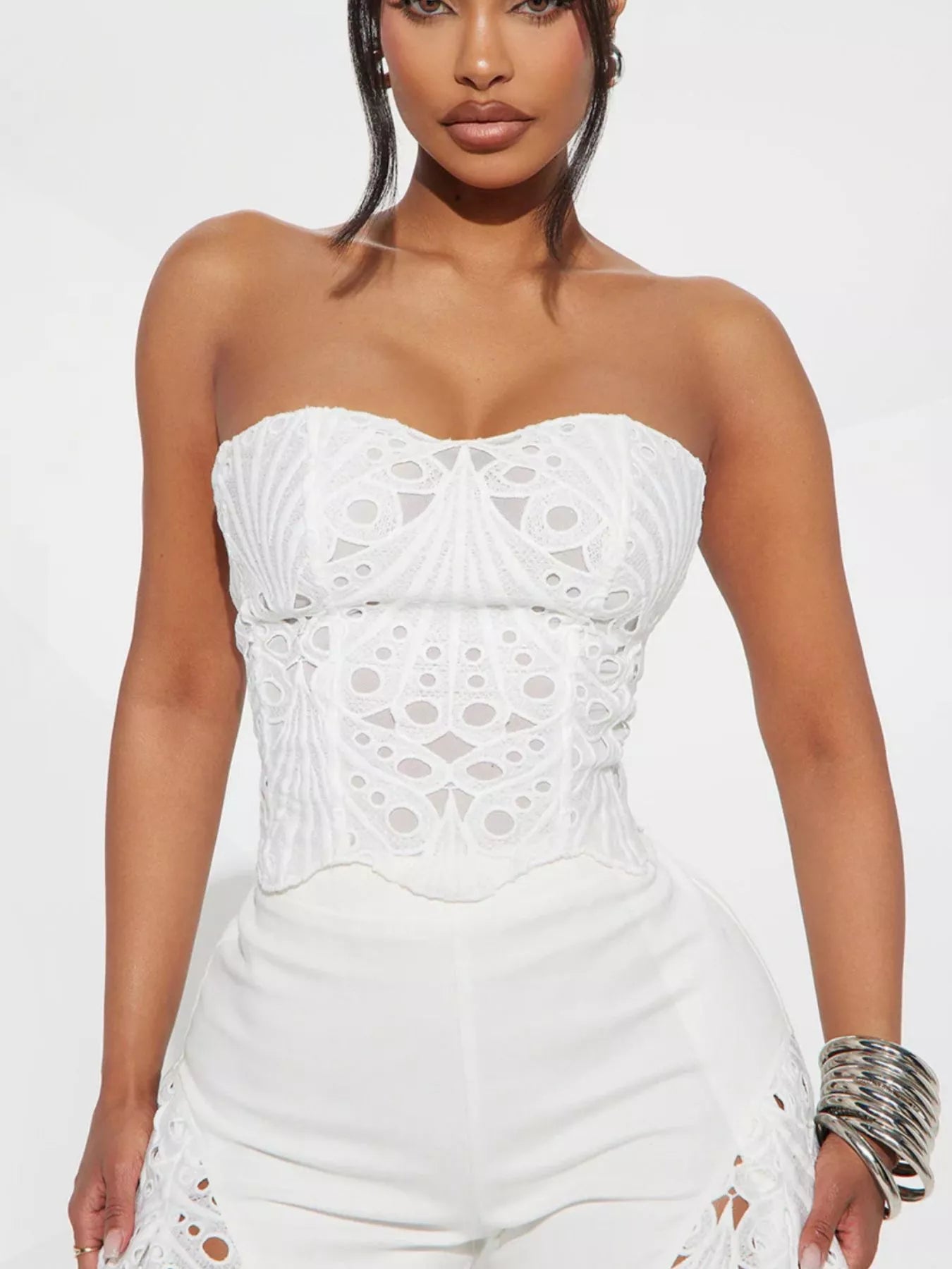 Trendsi matching set with a cutout tube top and wide-leg pants, featuring stylish design and trendy fit in a coordinated outfit.