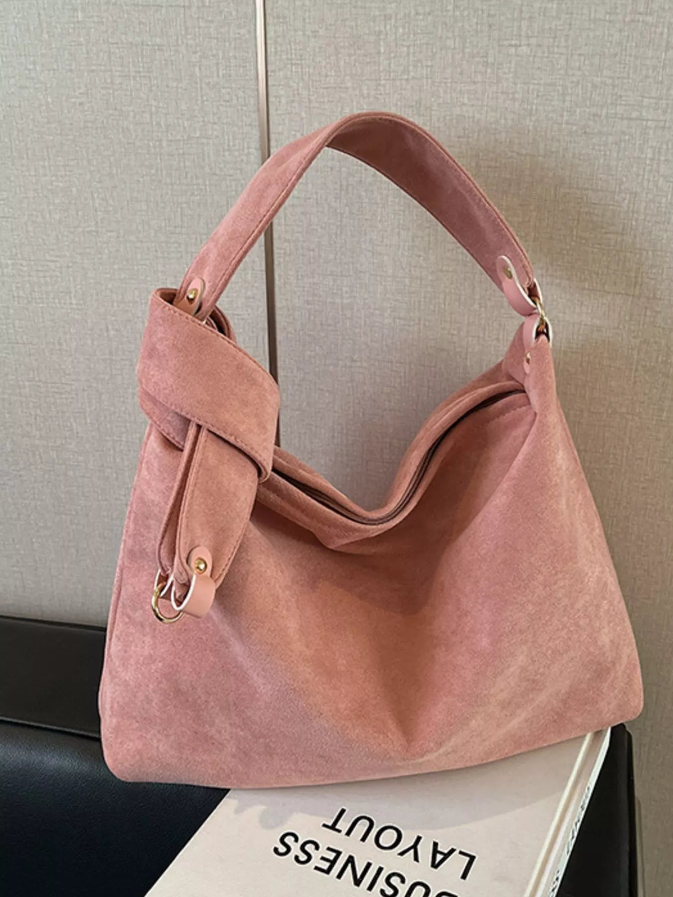 Suede hobo shoulder handbag with a relaxed, slouchy design, featuring a single shoulder strap and casual style from Trendsi.