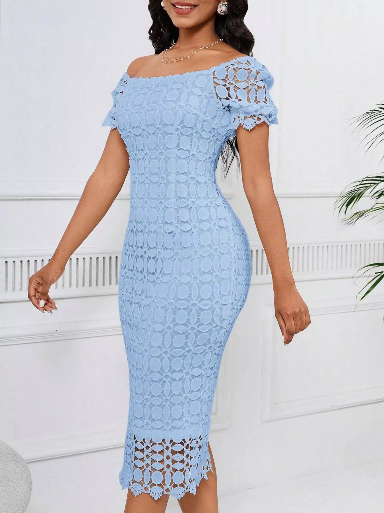Lace short sleeve midi dress from Trendsi featuring a fitted waist and intricate lace fabric, perfect for elegant occasions.