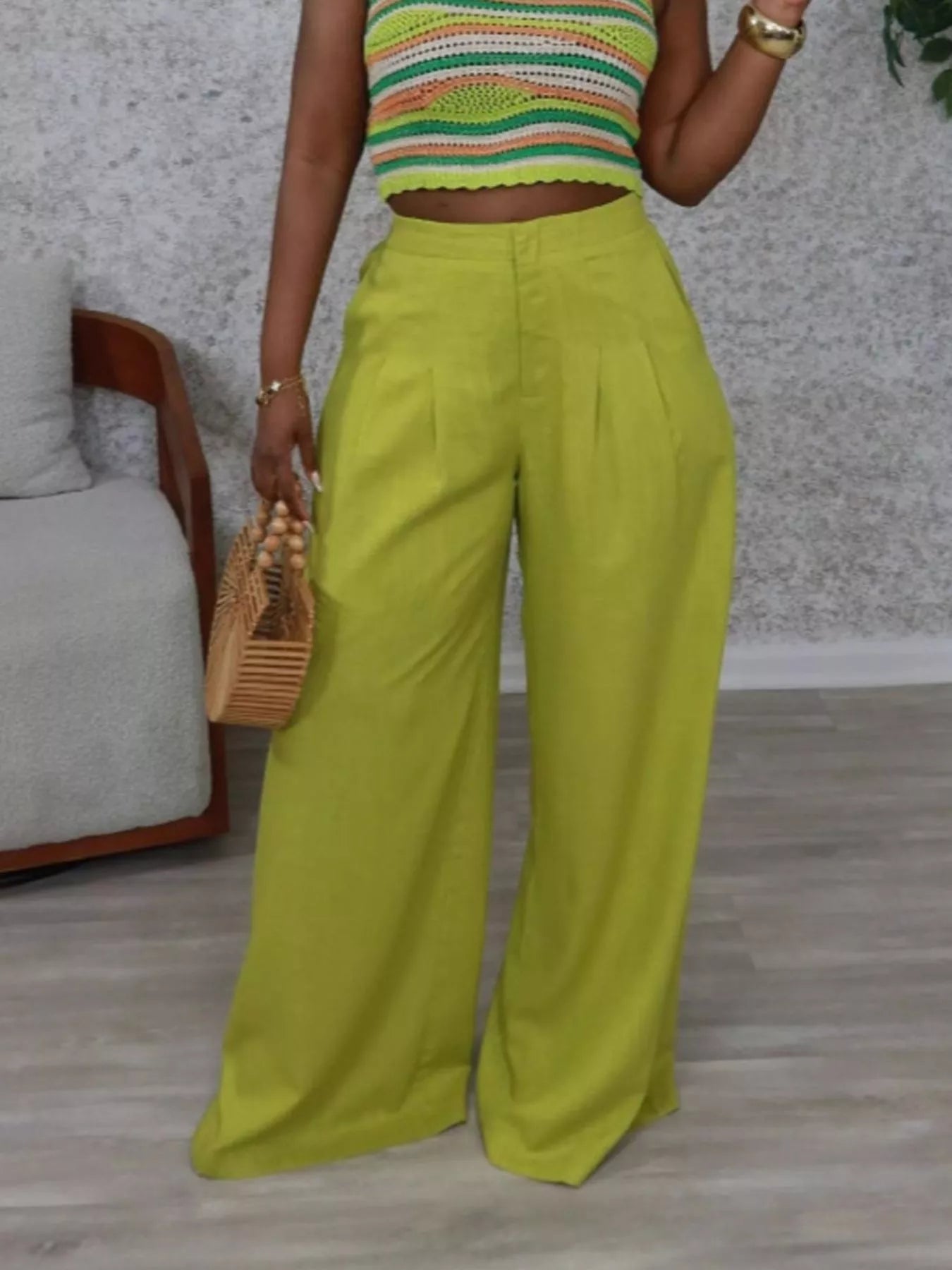 Wide-leg high waist flowy pants from Trendsi, featuring a relaxed fit, lightweight fabric, and stylish design for casual or dressy wear.