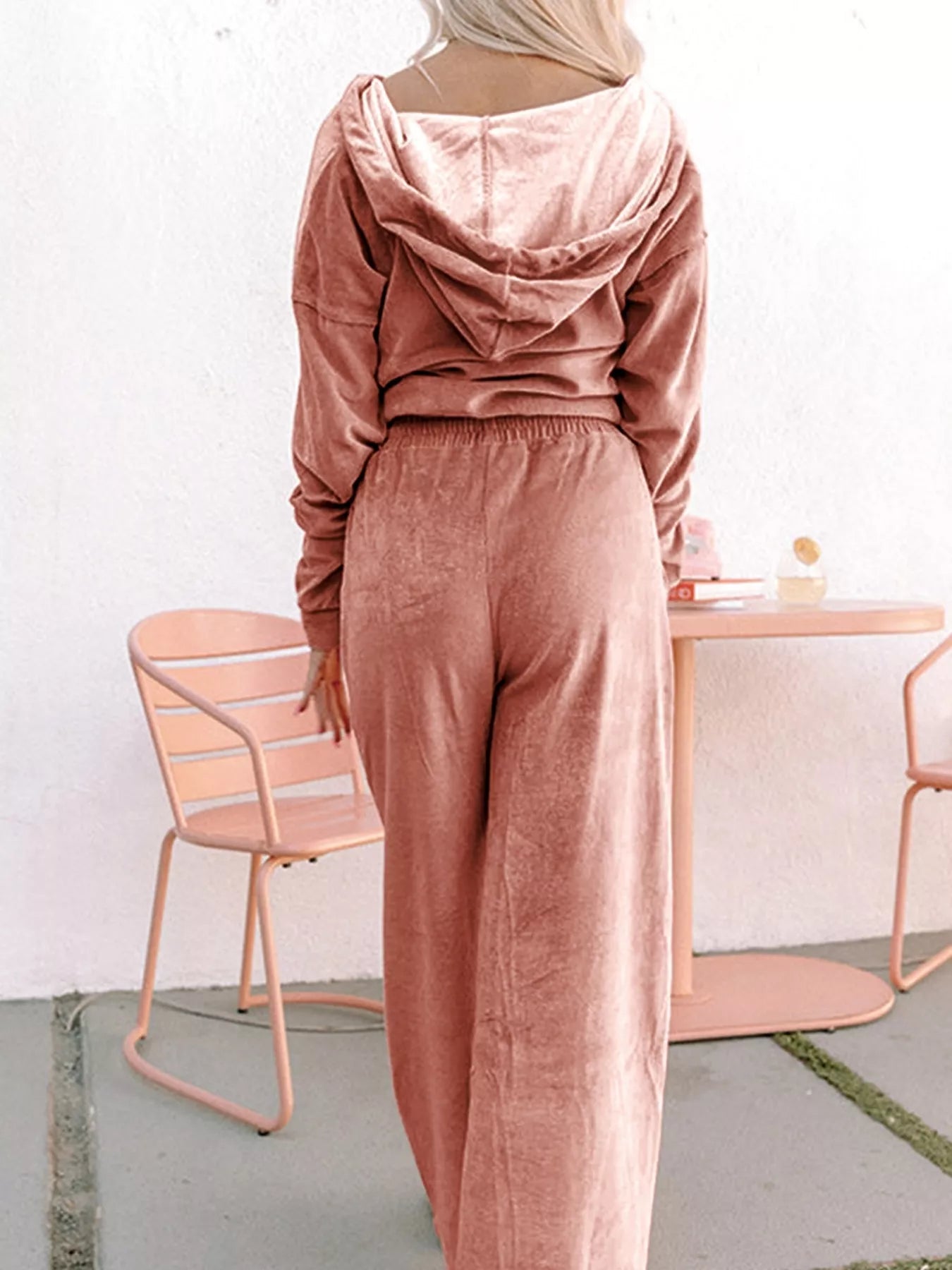 Zip-up dropped shoulder hooded top and matching pants set by Trendsi, casual loungewear with relaxed fit and comfortable fabric.