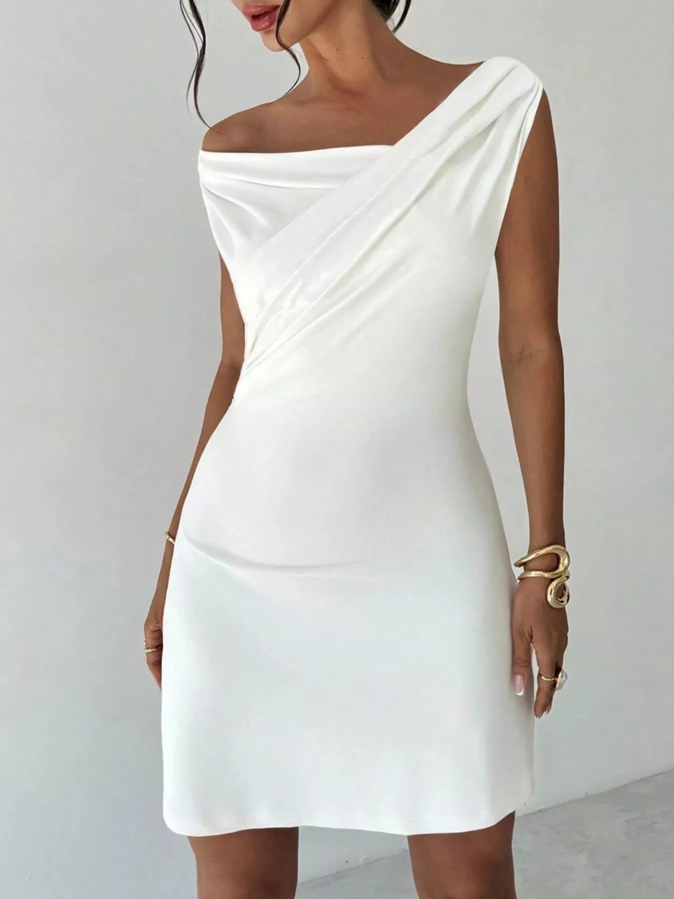 Elegant off-shoulder draped mini dress from Trendsi, stylish after 5 evening wear with a sophisticated design.