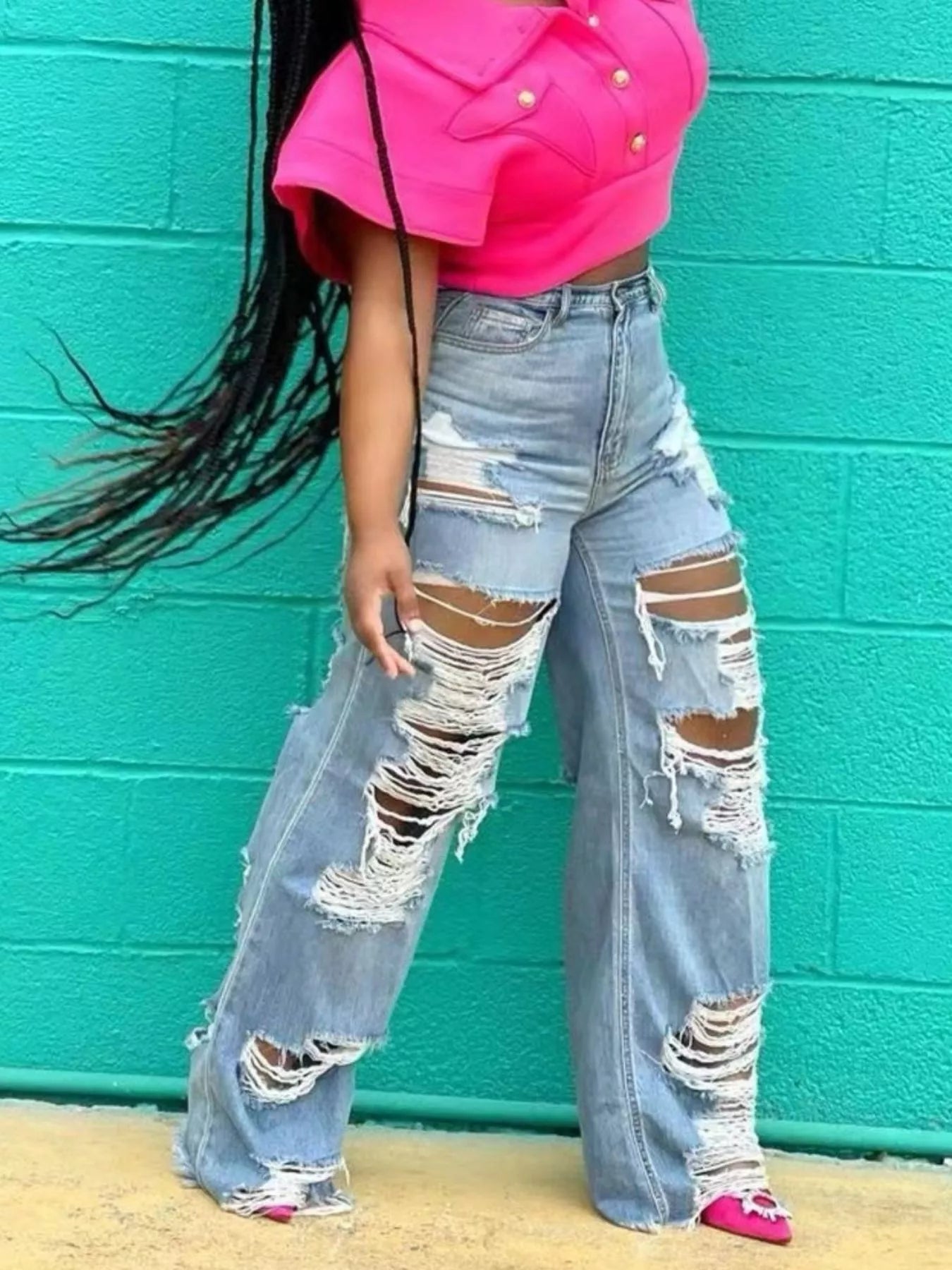Distressed wide-leg denim jeans by Trendsi featuring a relaxed fit, ripped details, and a high-waisted design.