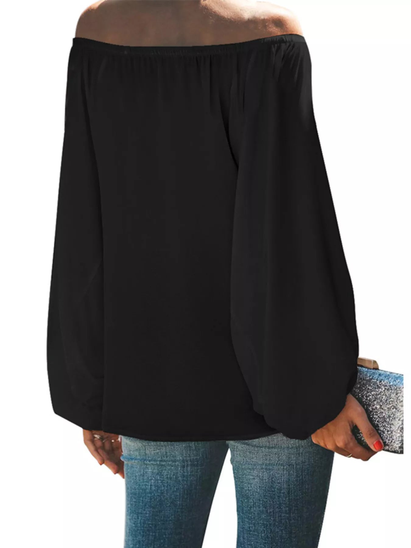 Off-shoulder balloon sleeve blouse from Trendsi, featuring a stylish design with puffed sleeves and a flattering neckline.