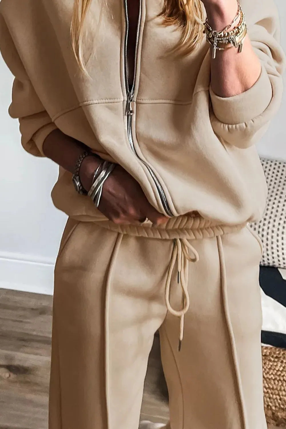 Trendsi zip-up long sleeve top and matching pants set in soft fabric, shown in a casual, comfortable style for everyday wear.