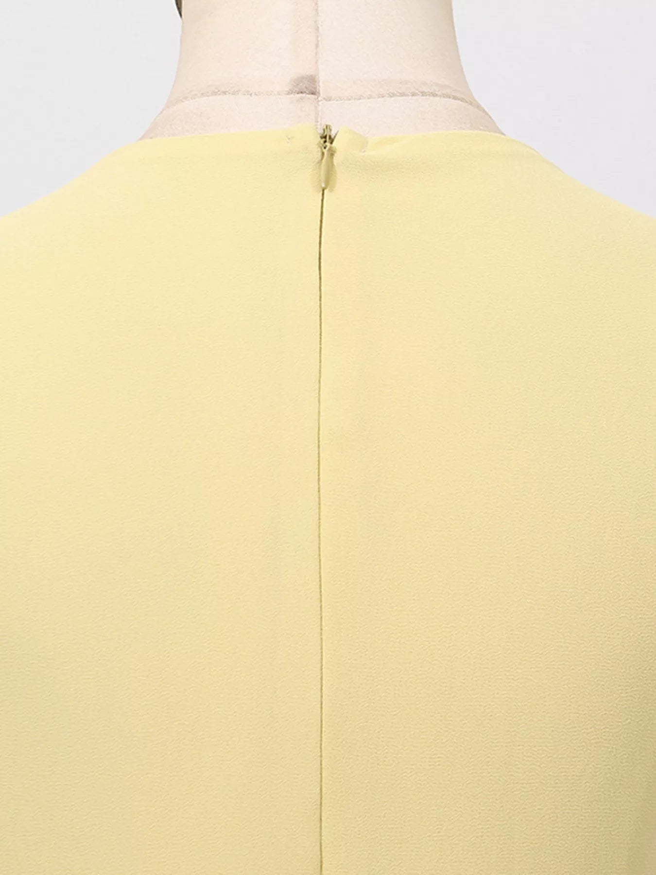 Yellow sleeveless ruched high-slit maxi dress by Trendsi, flowing fabric with a high slit and fitted bodice, perfect for summer events.