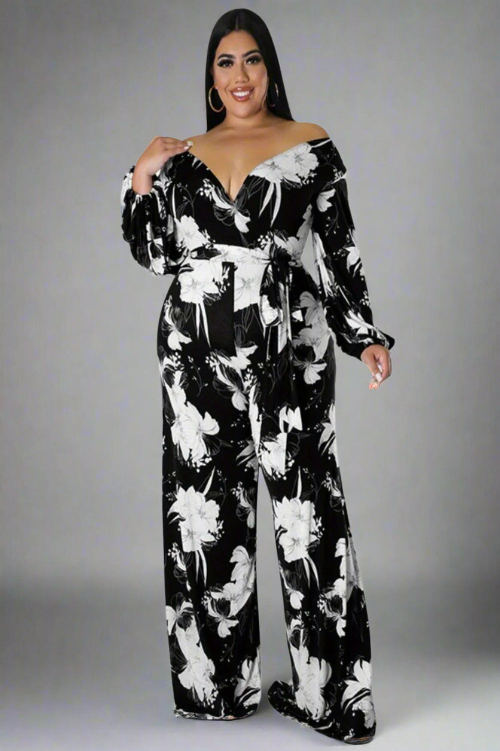 Floral Deep V-Neck Wide-Leg Jumpsuit – Black & White Elegance