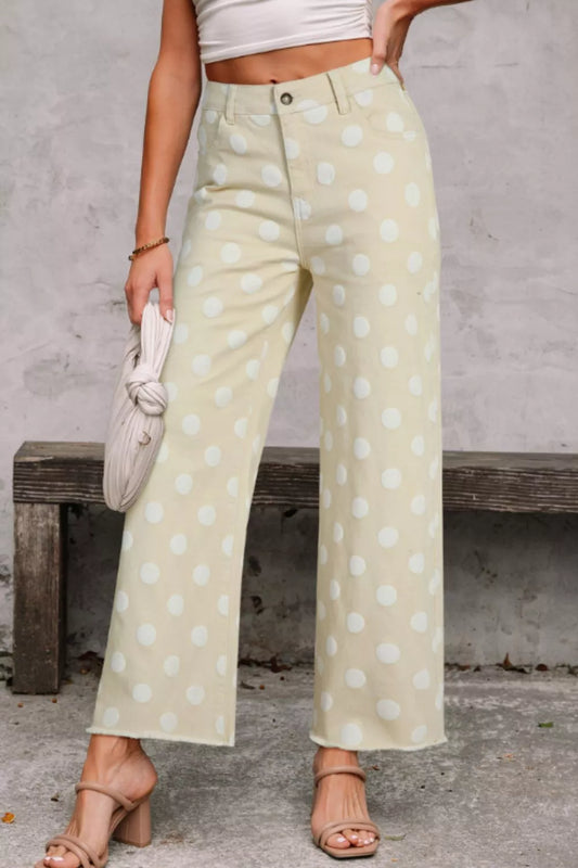 Polka dot high-waisted wide-leg jeans from Trendsi featuring a bold polka dot pattern and relaxed fit.