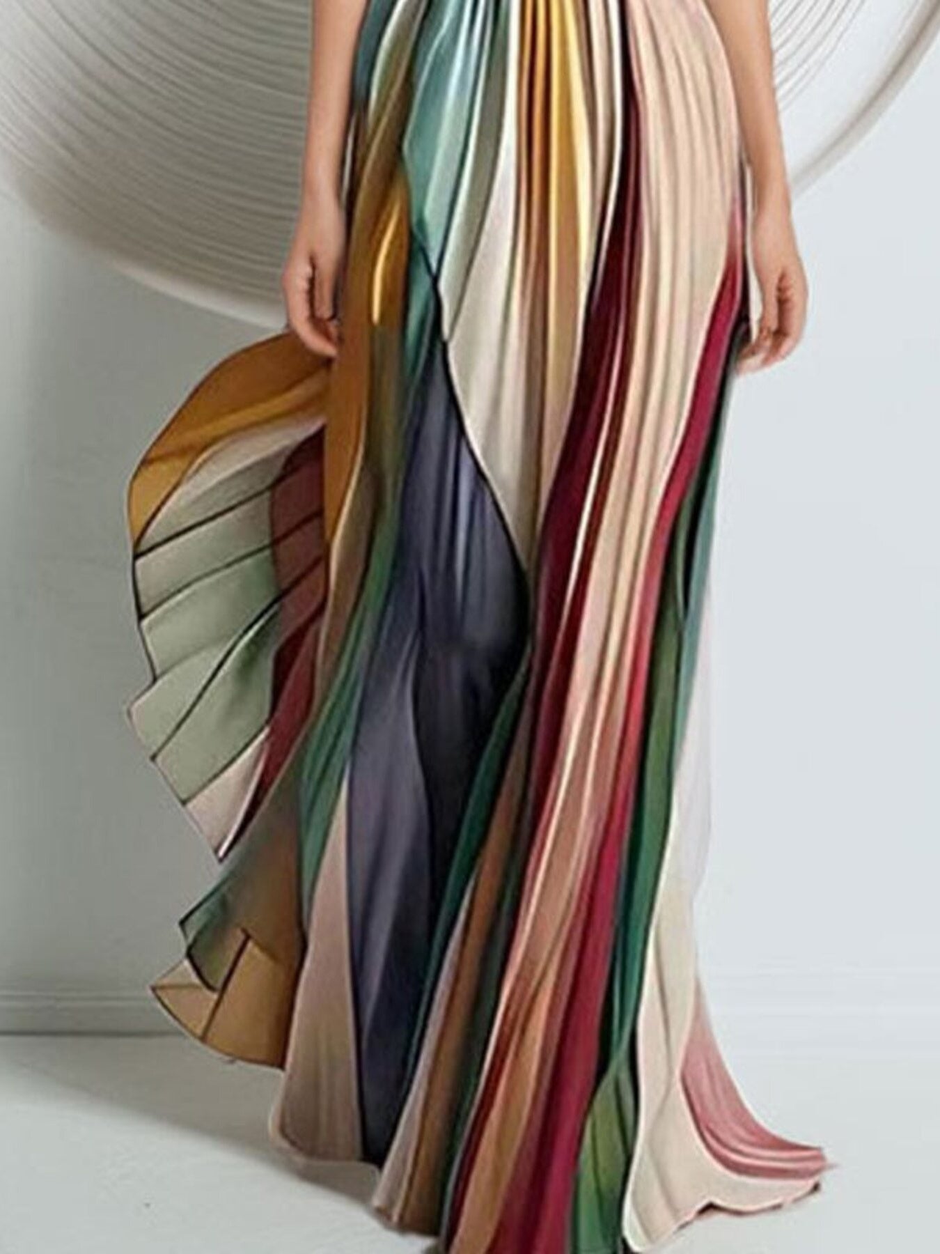 Striped pleated strapless maxi dress from Trendsi featuring a flowing design and bold vertical stripes, perfect for summer wear.