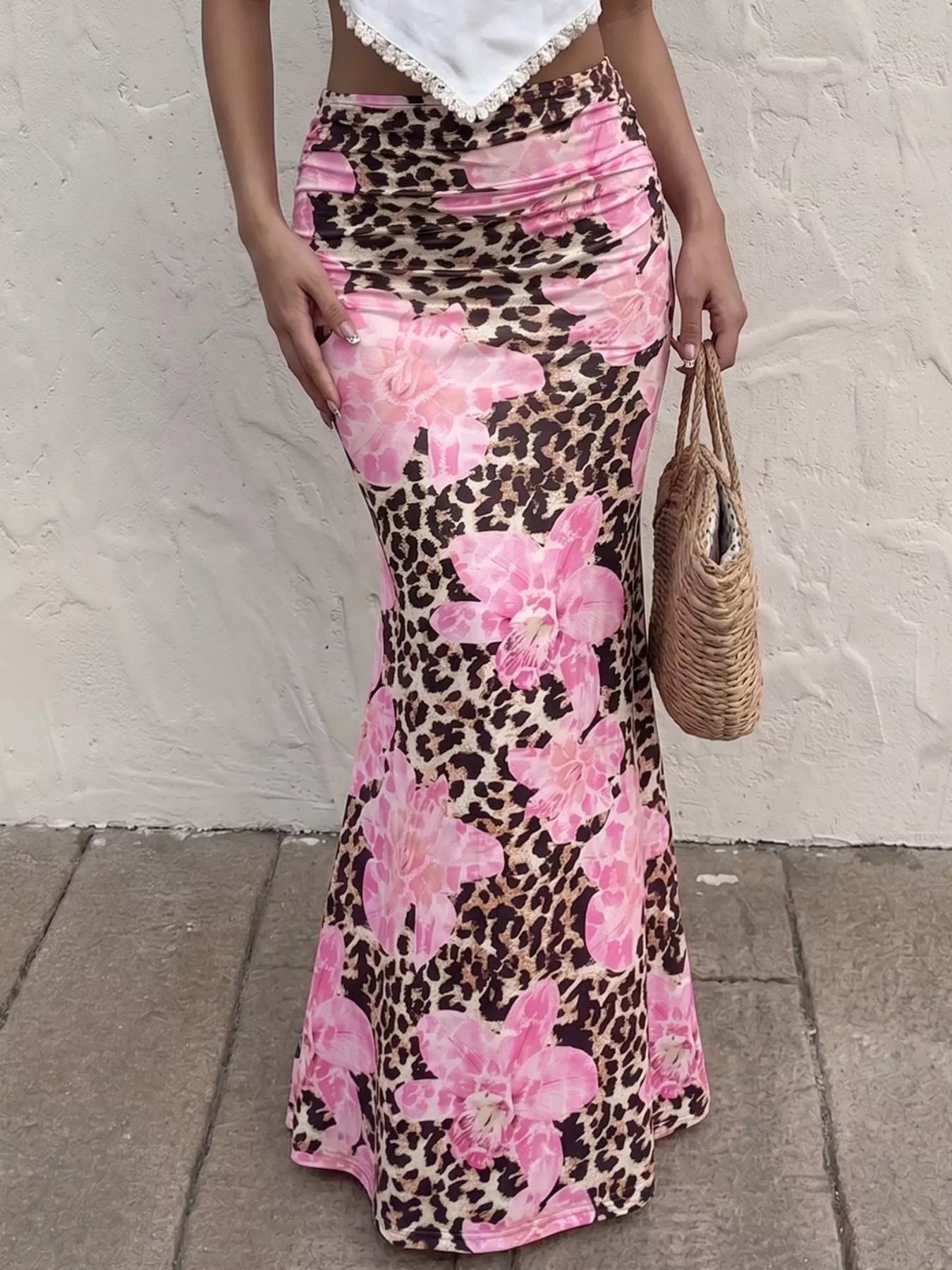 Leopard print bodycon maxi skirt from Trendsi, form-fitting design with a bold animal pattern, full-length silhouette.