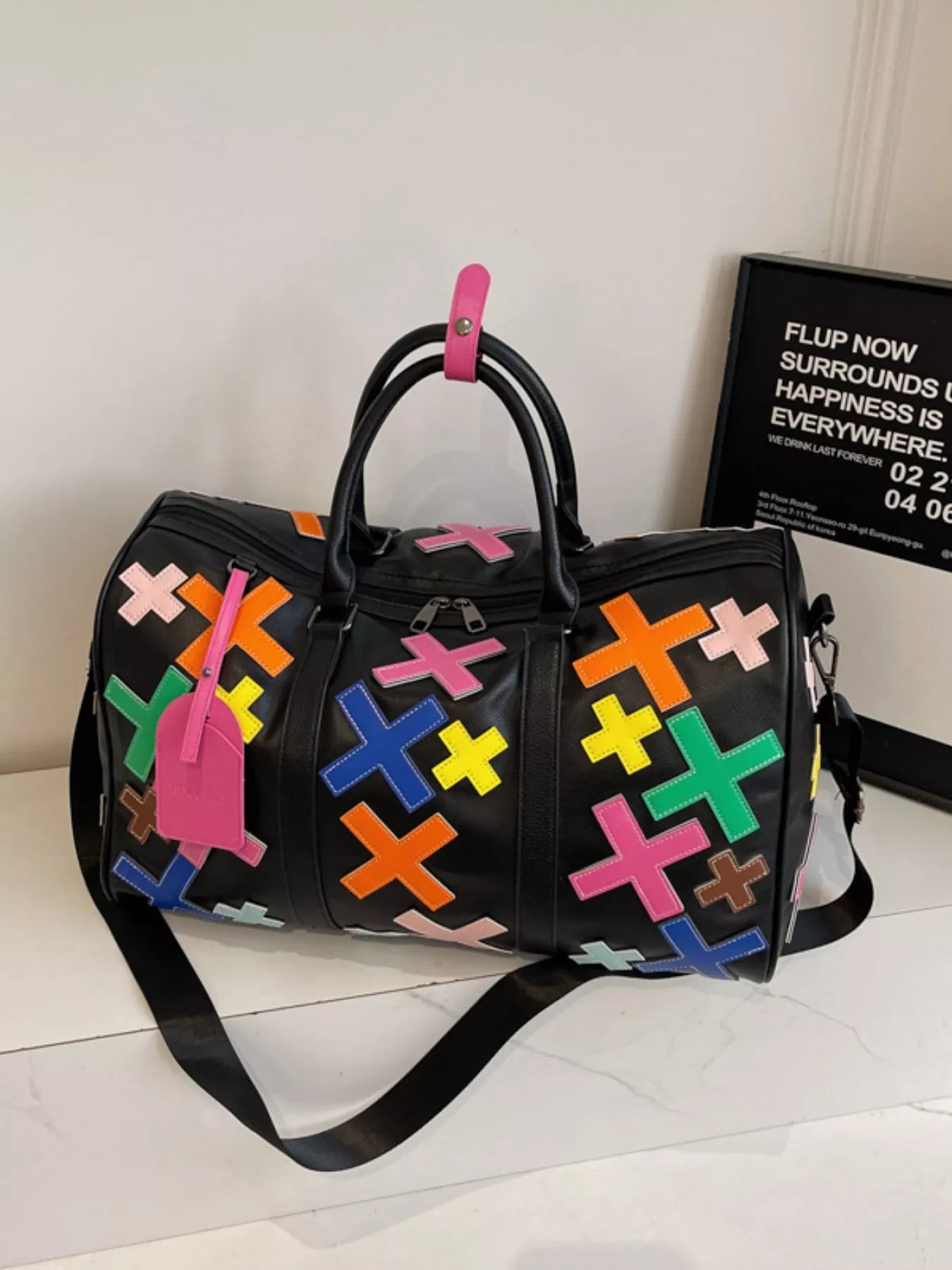 Colorful cross pattern Trendsi travel duffel bag with sturdy handles, spacious interior, perfect for weekend trips and travel.