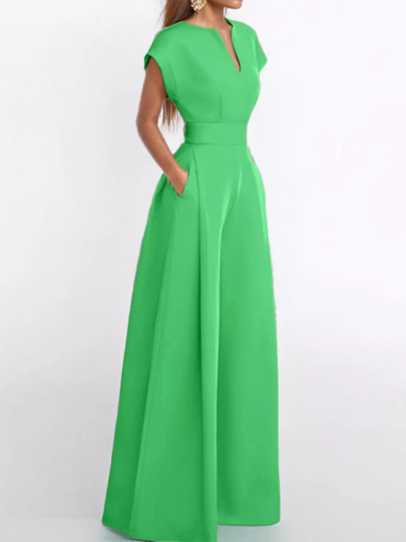 Notched wide-leg jumpsuit by Trendsi featuring a fitted bodice, wide legs, and stylish notch details in a sleek design.