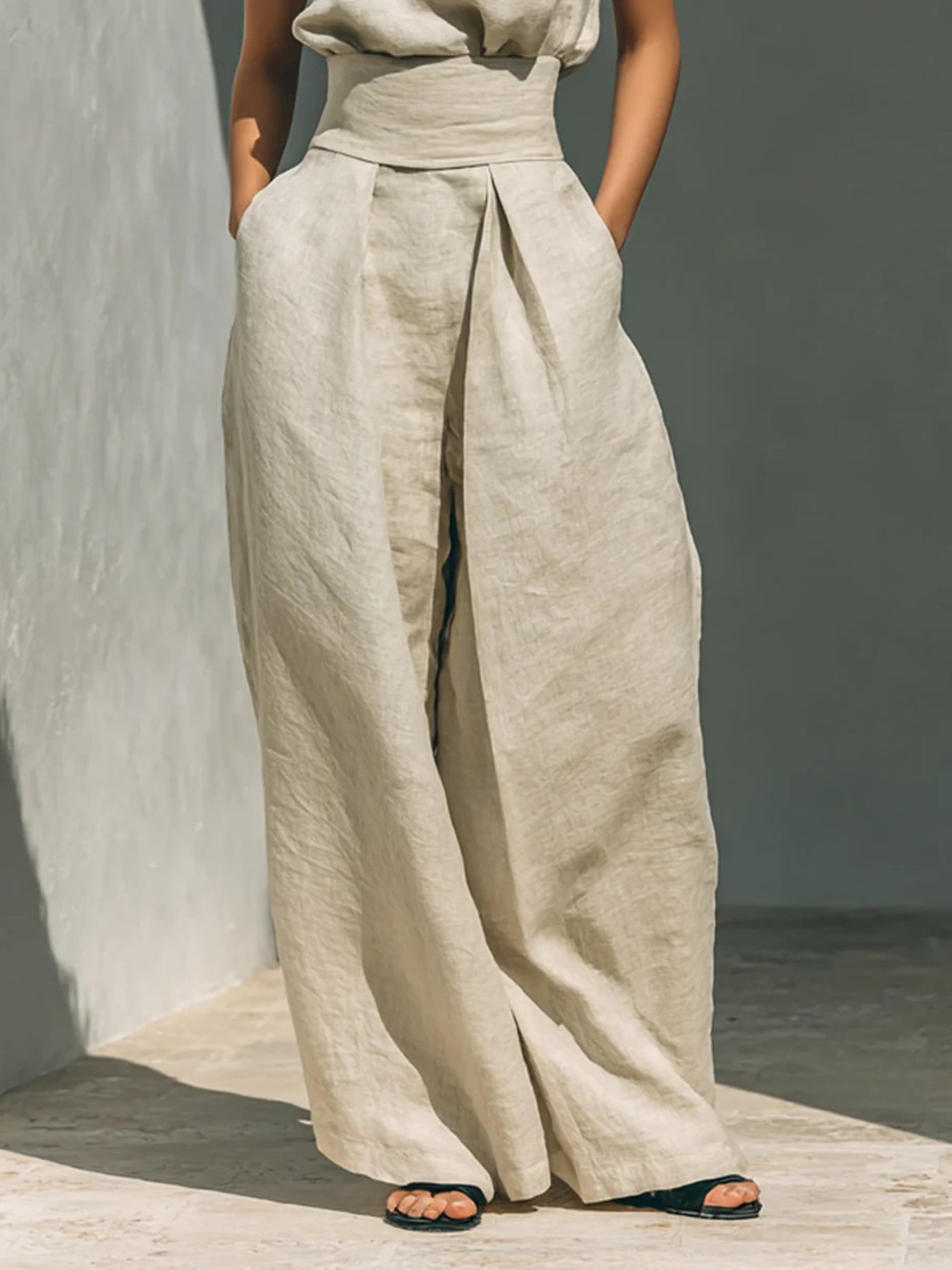 Sleeveless turtleneck top and matching pants set by Trendsi, stylish and comfortable outfit for casual or chic looks.