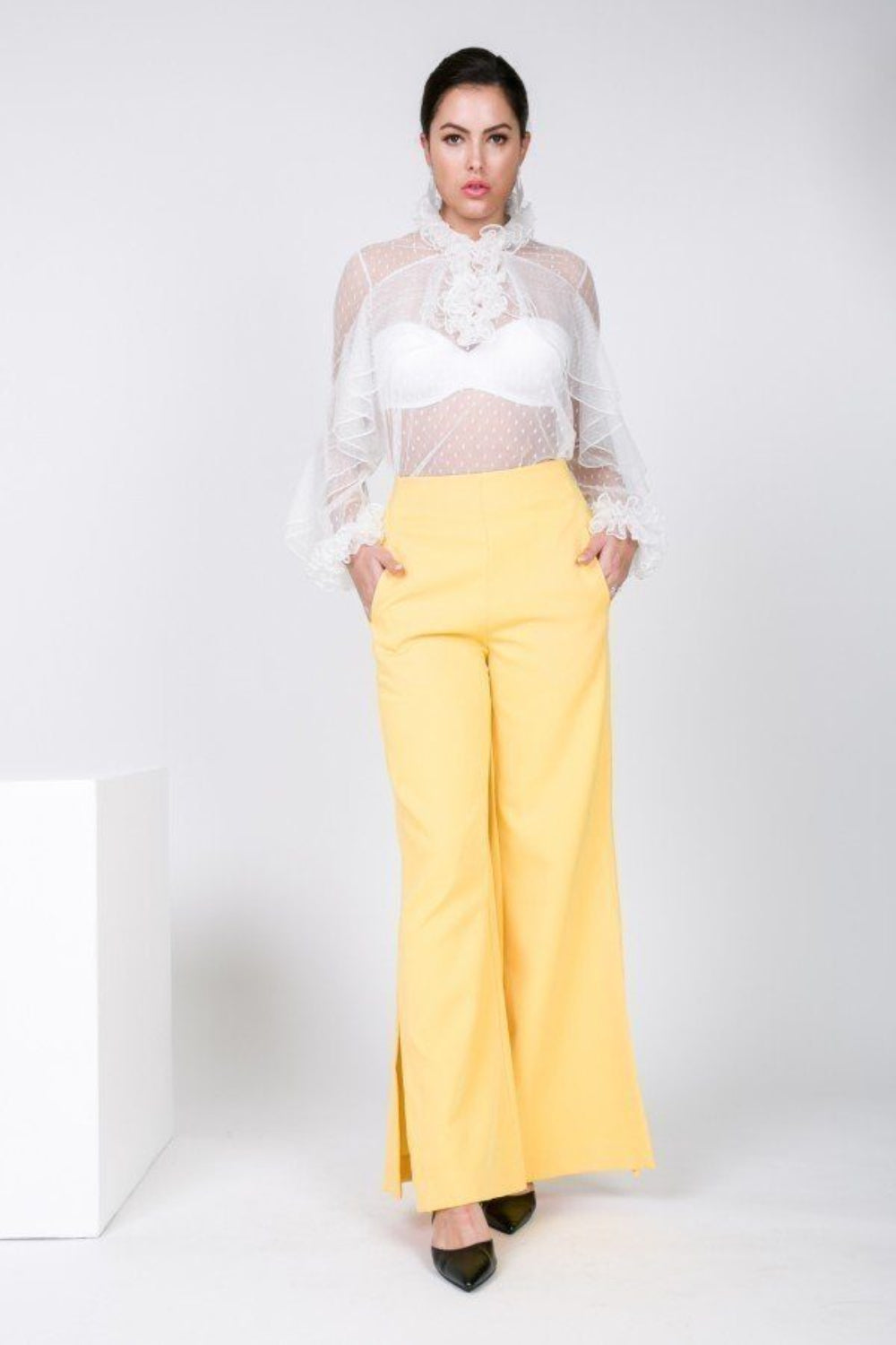 Yellow Toshe Women's Fashions side slit wide leg pants with a relaxed fit and flowing fabric.