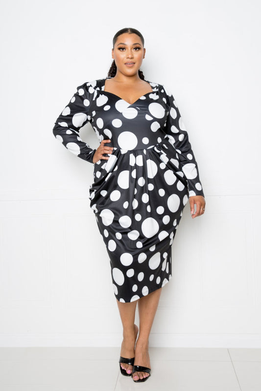 Polka dot drop waist ruched midi dress by Toshe Women's Fashions, featuring a flowing silhouette and stylish design.