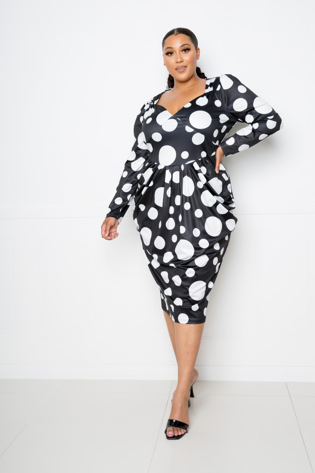 Polka dot drop waist ruched midi dress by Toshe Women's Fashions featuring a flowy silhouette and stylish pattern.