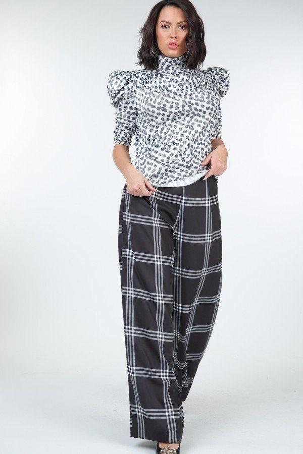 Toshe Women's Fashions high waist plaid print wide leg pants hanging on a rack with a checkered pattern and tailored fit.