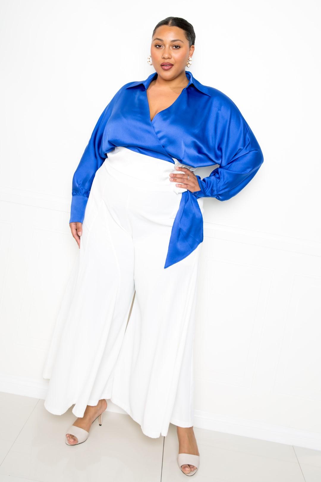 White Palazzo Pants from Toshe Women's Fashions, flowing wide-leg style with elastic waistband on a model.