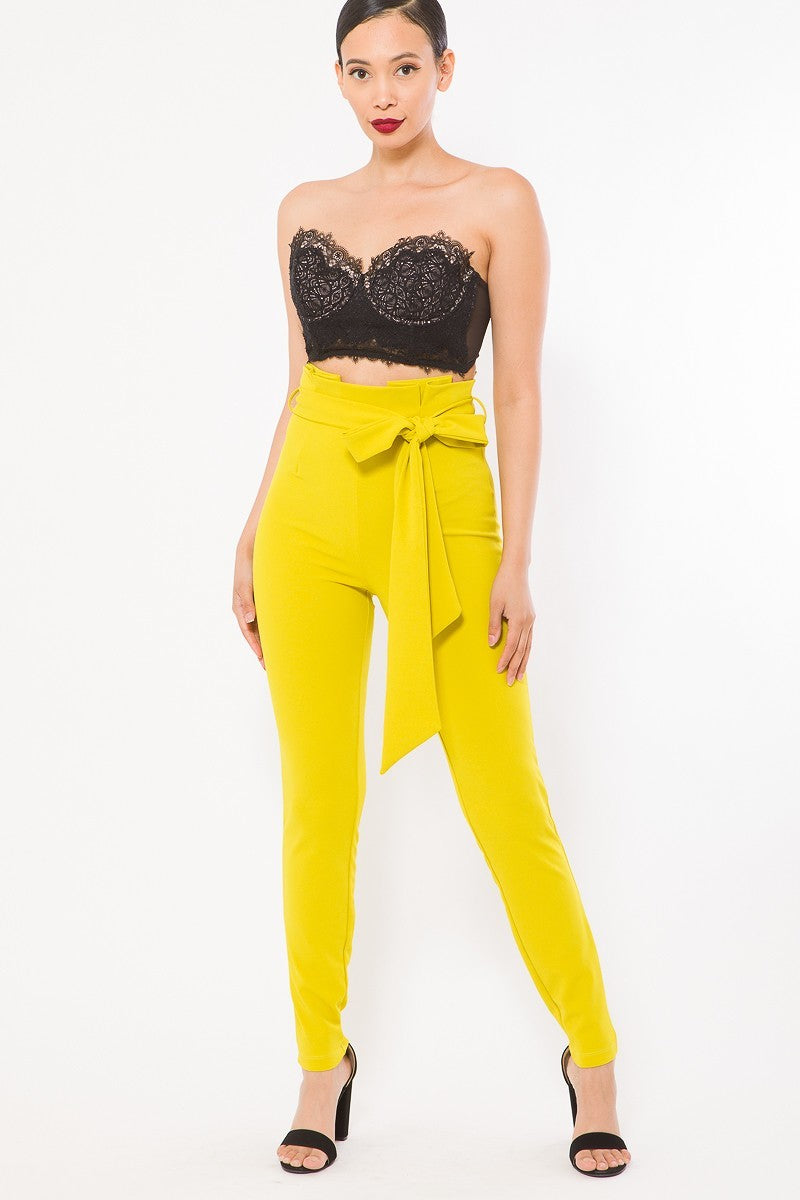 High waist fashion skinny pants by Toshe Women's Fashions, shown in black, with a close-up of the fitted design and waistband.