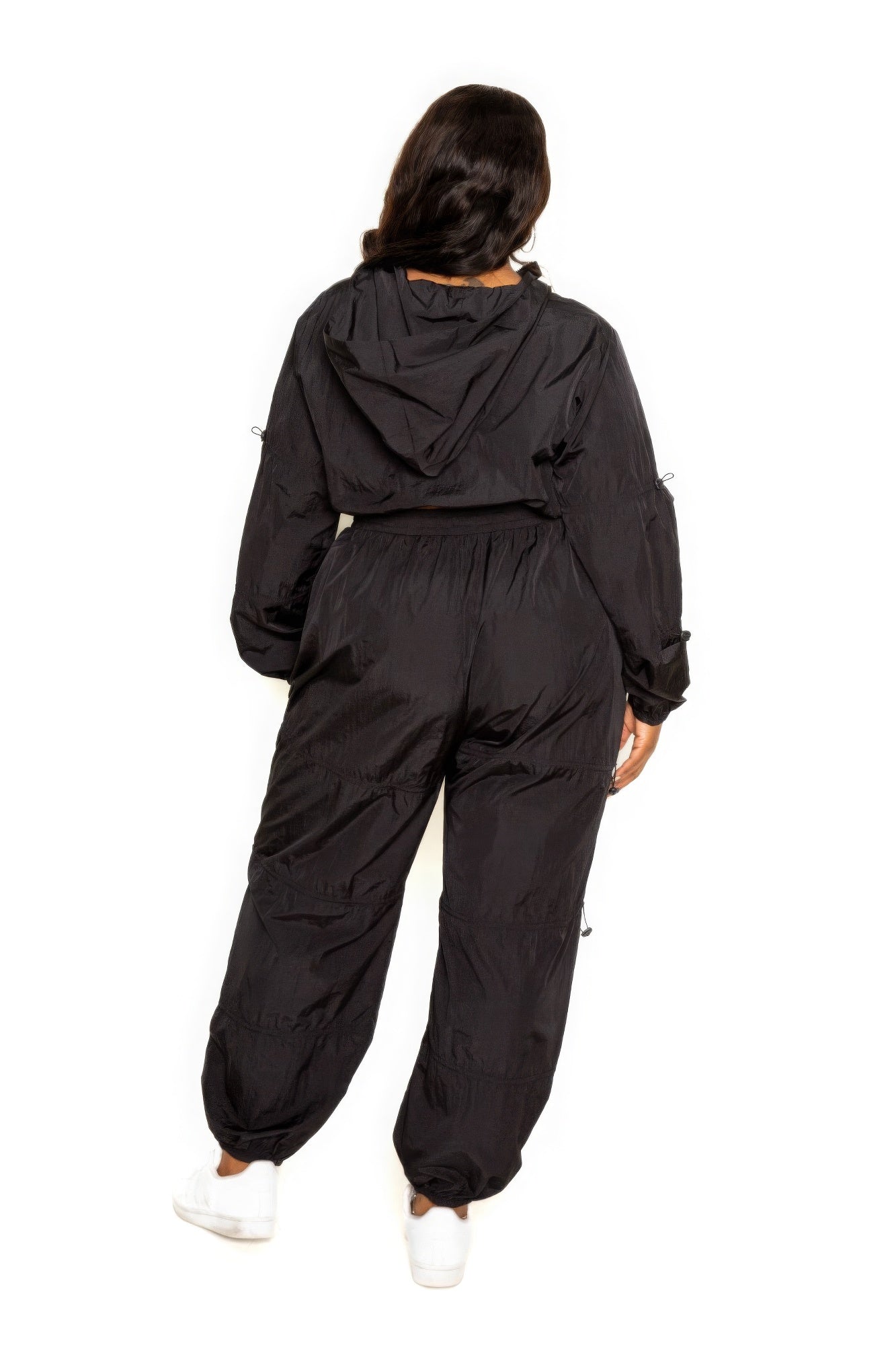 Toshe women's cropped zip-up top and pants set with cord lock details, casual loungewear outfit in soft fabric.