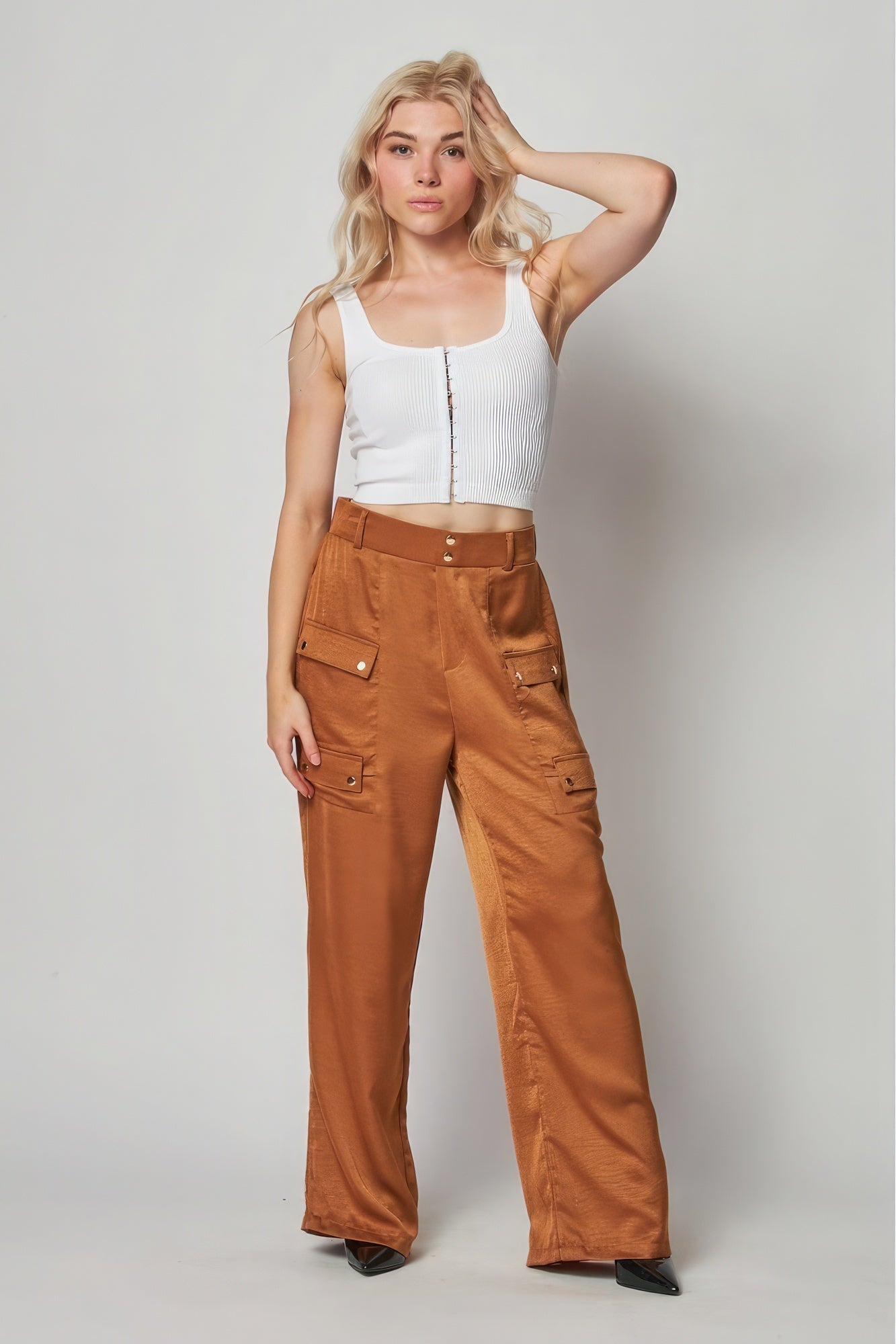 Satin cargo pocket wide-leg pants in a soft sheen fabric, featuring large front pockets and a relaxed fit from Toshe Women's Fashions.