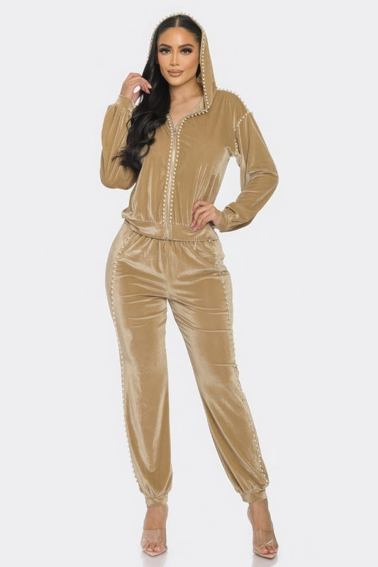 Toshe Women's Fashions pearl-embellished jogger set featuring comfortable joggers with pearl details on a neutral background.