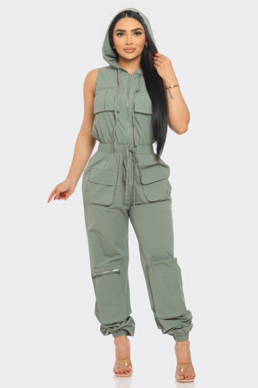 Toshe Women's Fashions cargo jumpsuit with multiple pockets, adjustable waist, and rolled-up sleeves, displayed on a hanger.