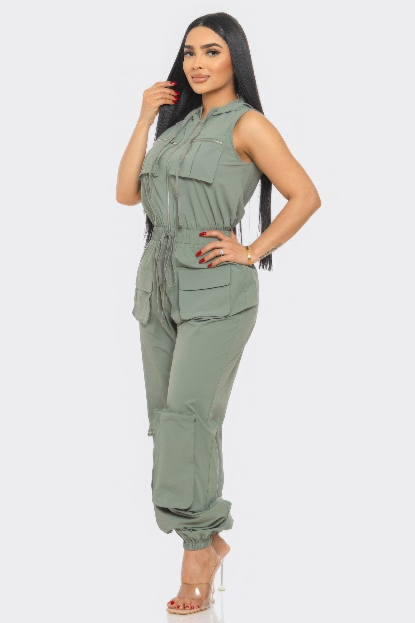 Toshe Women's Fashions cargo jumpsuit featuring multiple pockets, relaxed fit, and adjustable waist in lightweight fabric.