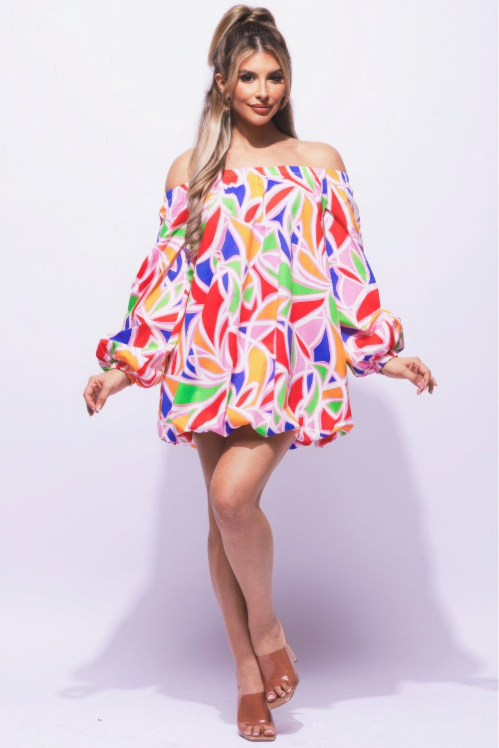 Off-shoulder bubble dress by Toshe Women's Fashions featuring a stylish ruffled neckline and puffed sleeves.