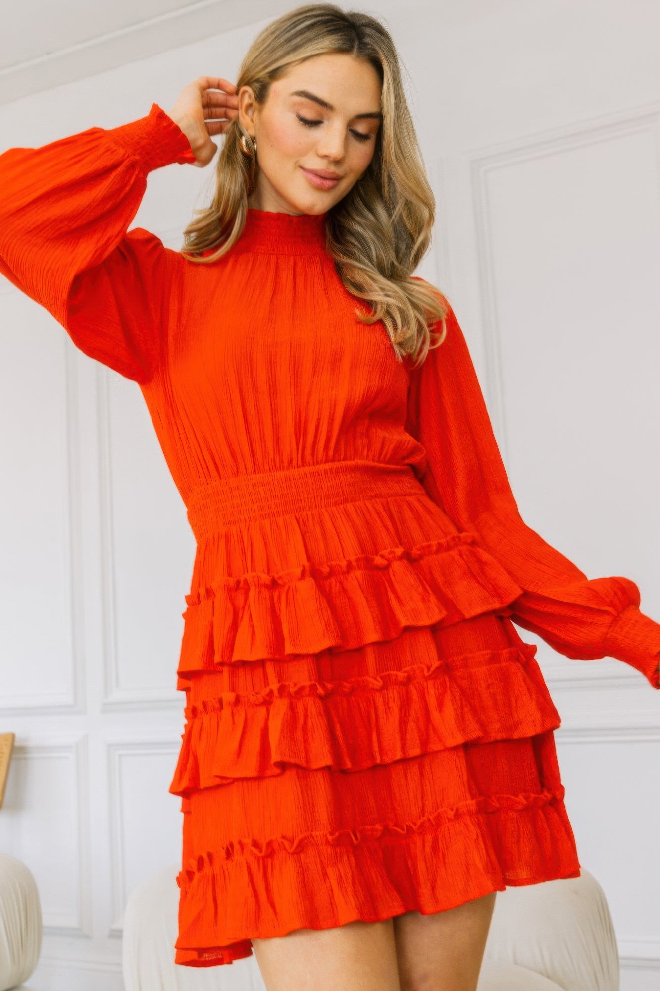 Smocked neck tiered ruffle mini dress by Toshe Women's Fashions, featuring a flowy silhouette and feminine details.