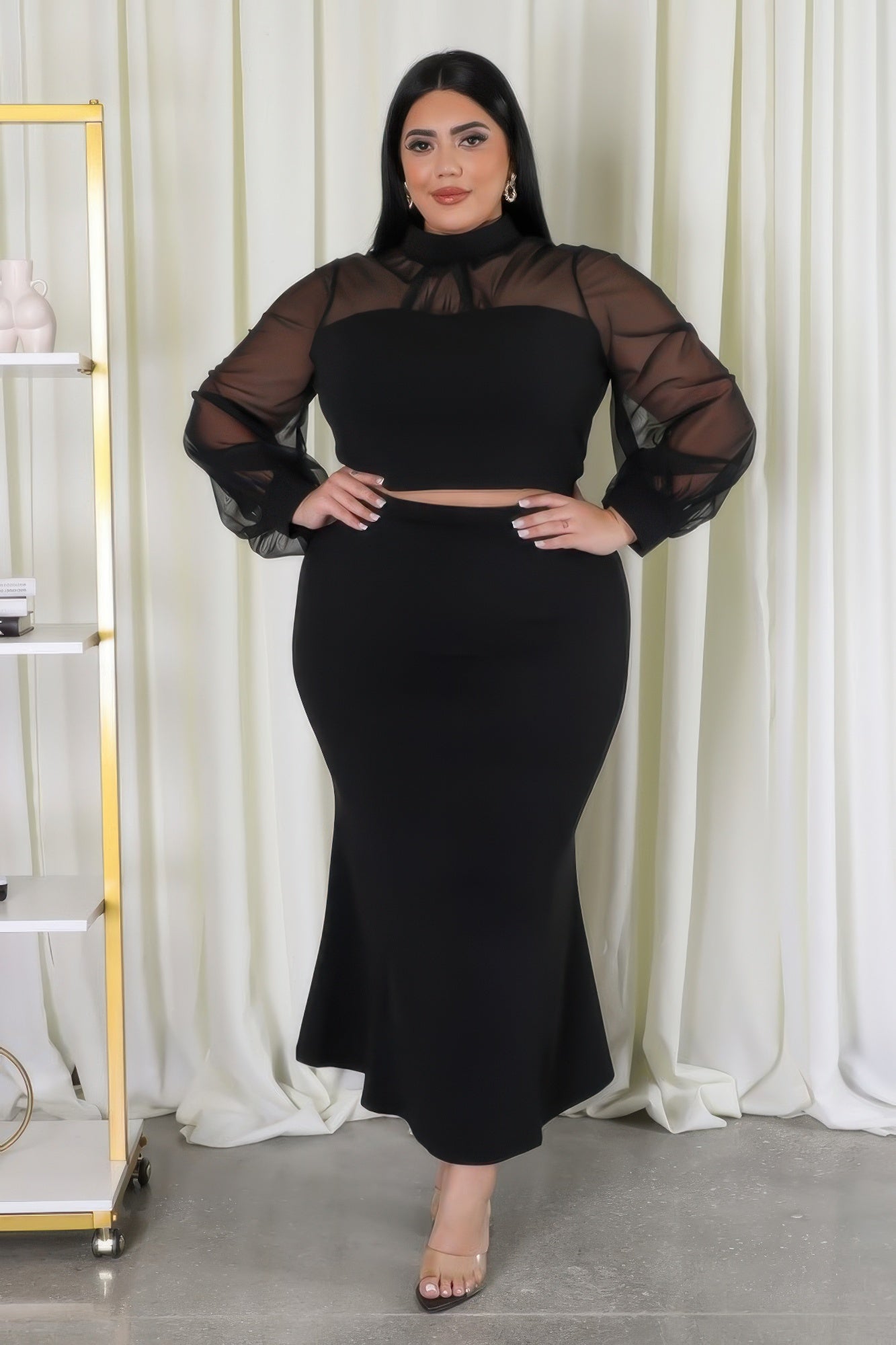 Sheer sleeve crop top and mermaid skirt set by Toshe Women's Fashions, featuring a stylish, coordinated outfit with sheer details.