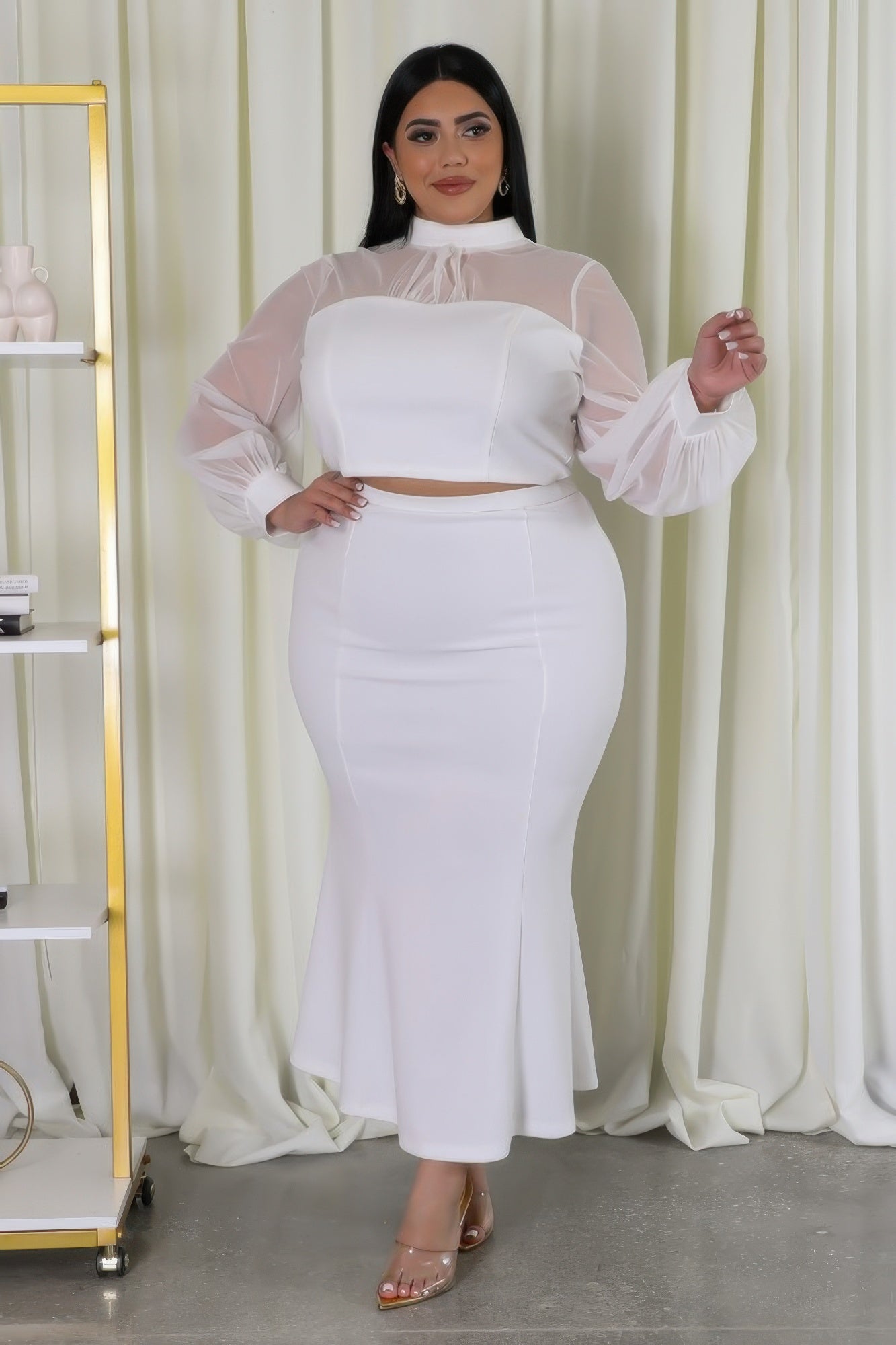 Sheer sleeve crop top and mermaid skirt set by Toshe Women's Fashions, featuring stylish design and fitted silhouette.