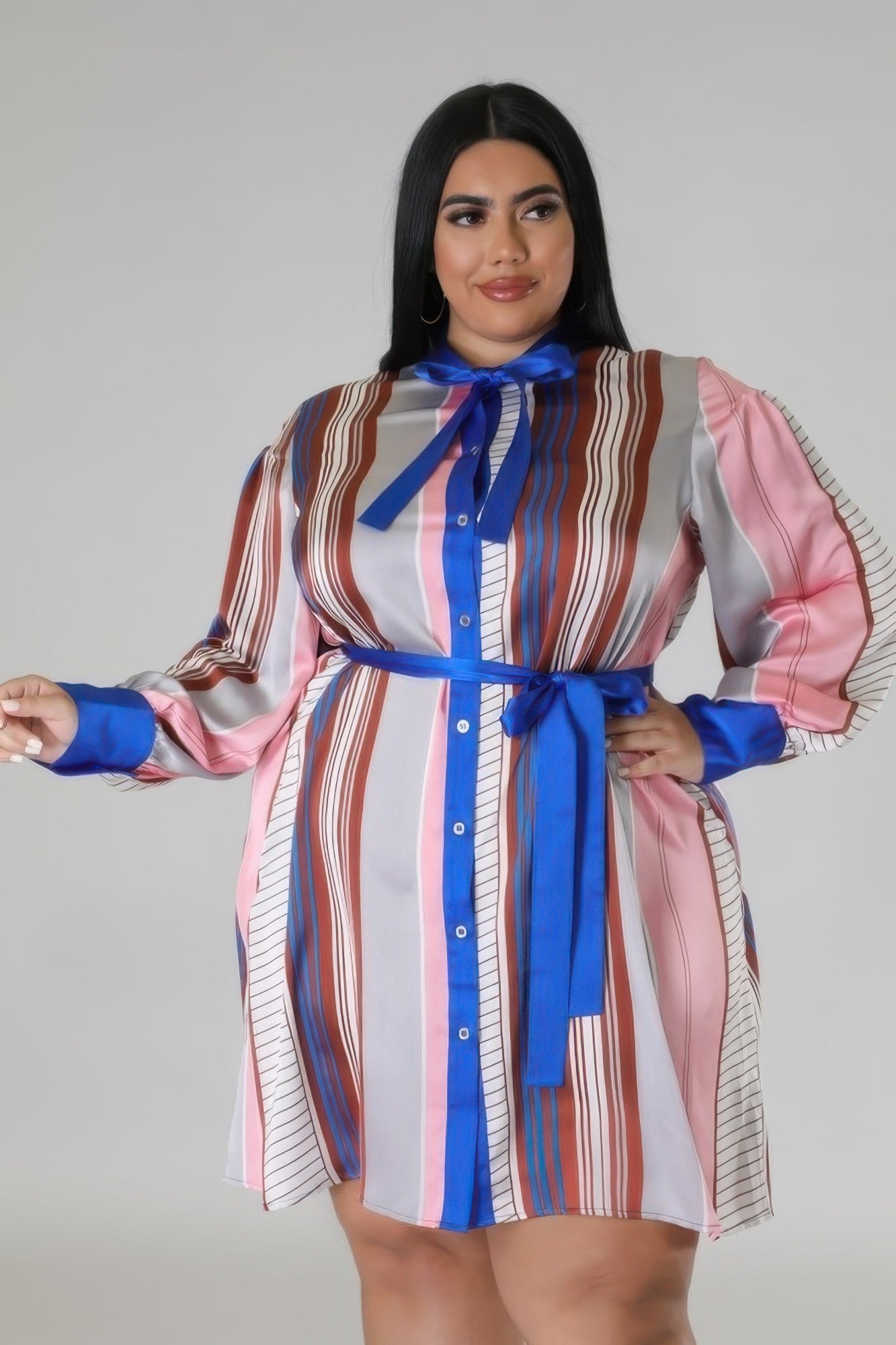 Toshe Women's Fashions bow tie neck stripe belted dress with long sleeves and a fitted silhouette.