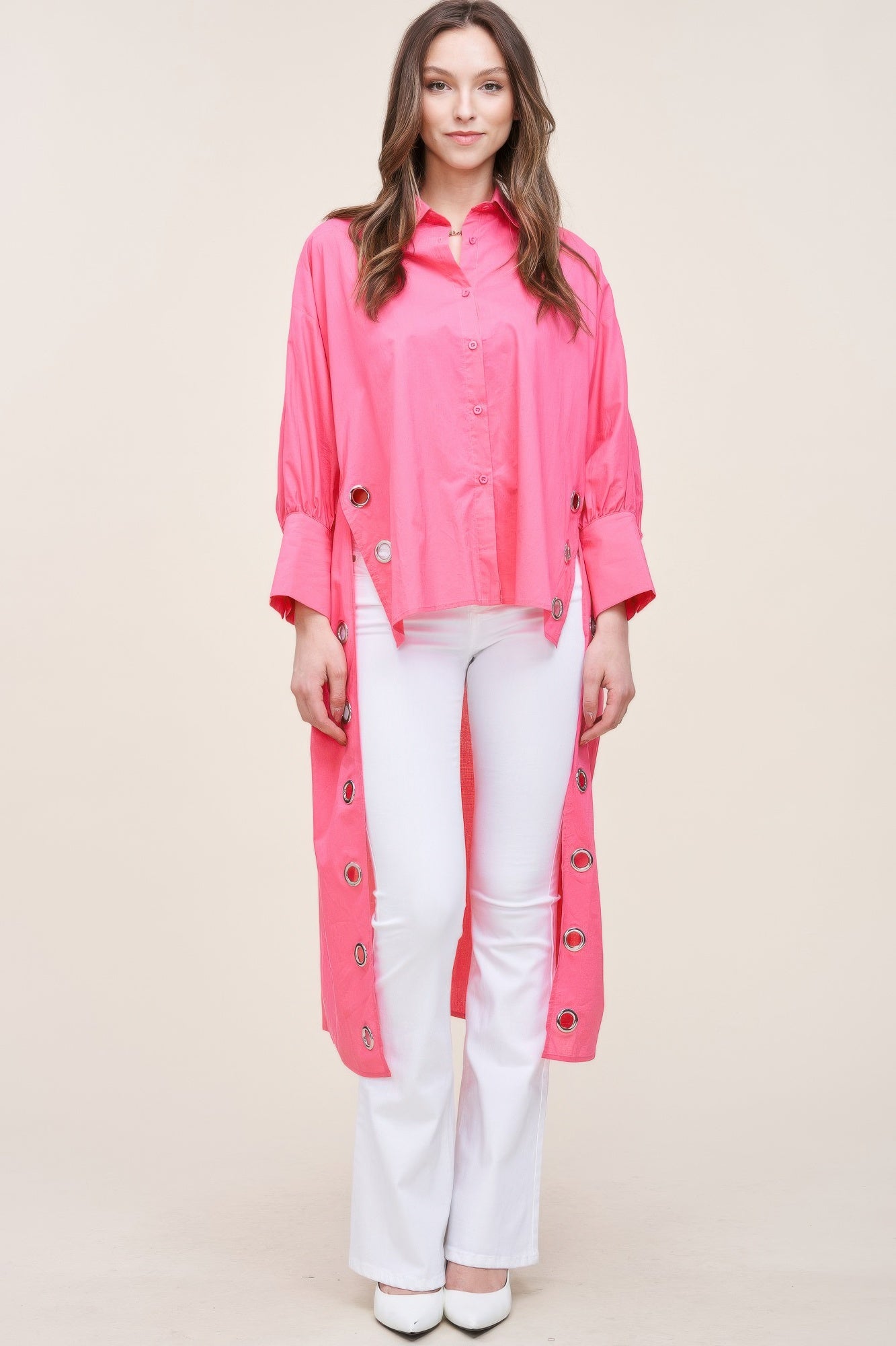 Oversized asymmetrical shirt by Toshe Women's Fashions, featuring a loose fit and unique hemline in soft fabric.