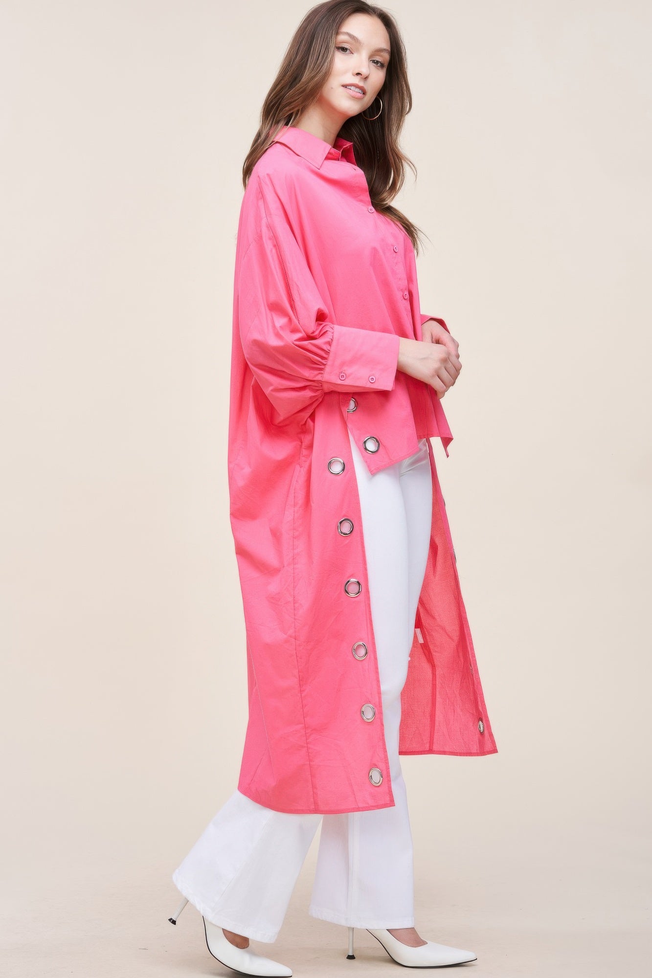 Oversized asymmetrical shirt by Toshe Women's Fashions featuring a loose fit and unique hemline in soft fabric.