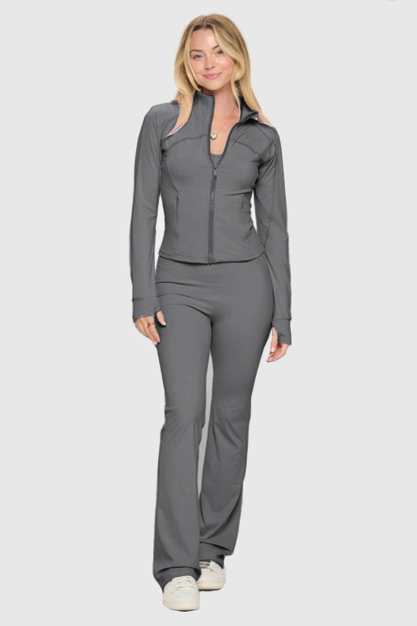 Toshe Women's Fashions fitted zipper jacket and pants set, stylish and comfortable activewear outfit.